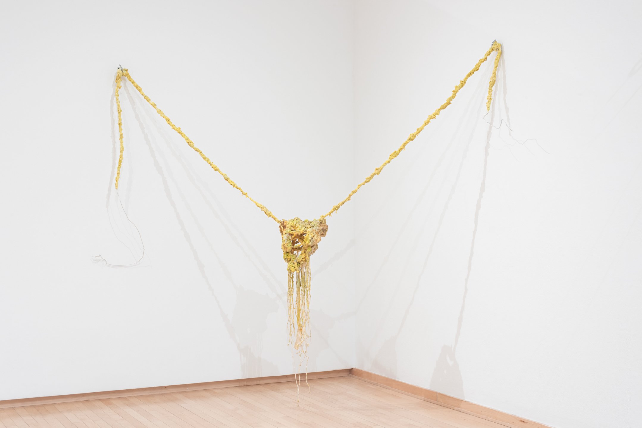 "Whisper of the souls!" 2025,
wax, silicone, recycled fabric and rope, plaster, metal.
70x 60 x 10 inches.