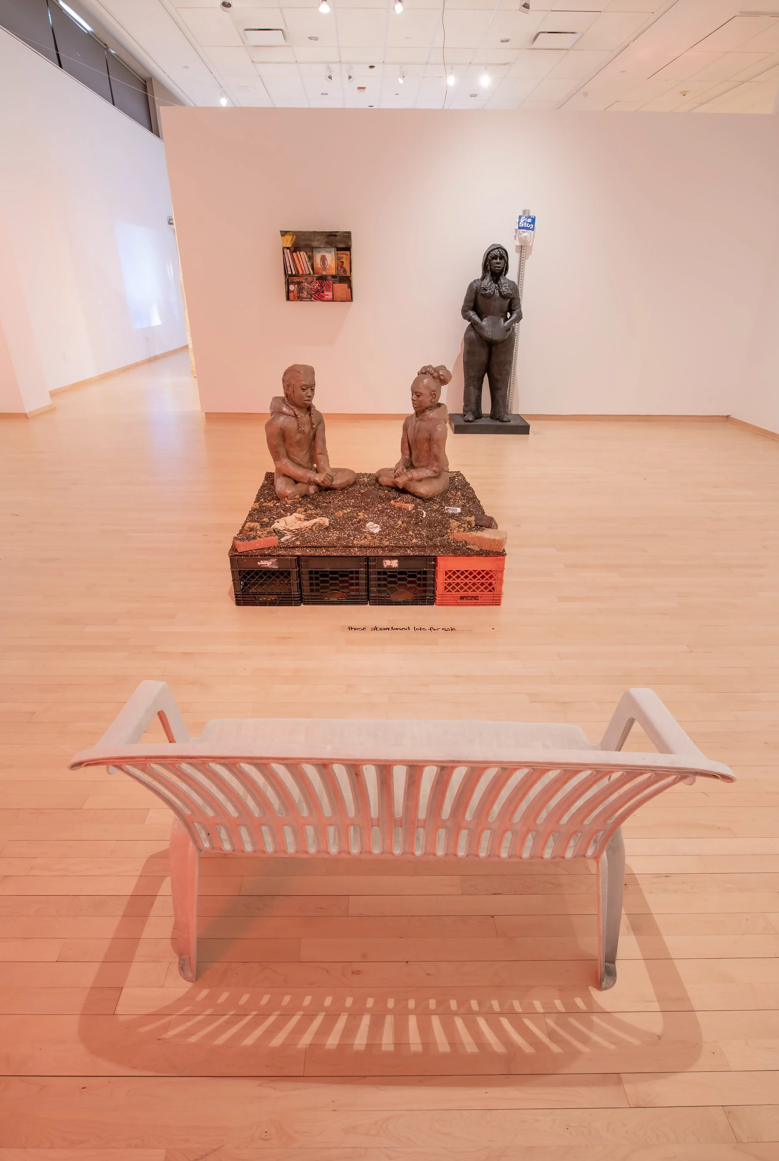"Those abandoned lots for sale...," Installation, stoneware, porcelain, locally dug clay (Temple University Campus), mudcloth fabric (cotton, black tea & locally dug clay), kiln-cast glass and bricks, 48" by 48" by 36" Photo Credit: John Carlano