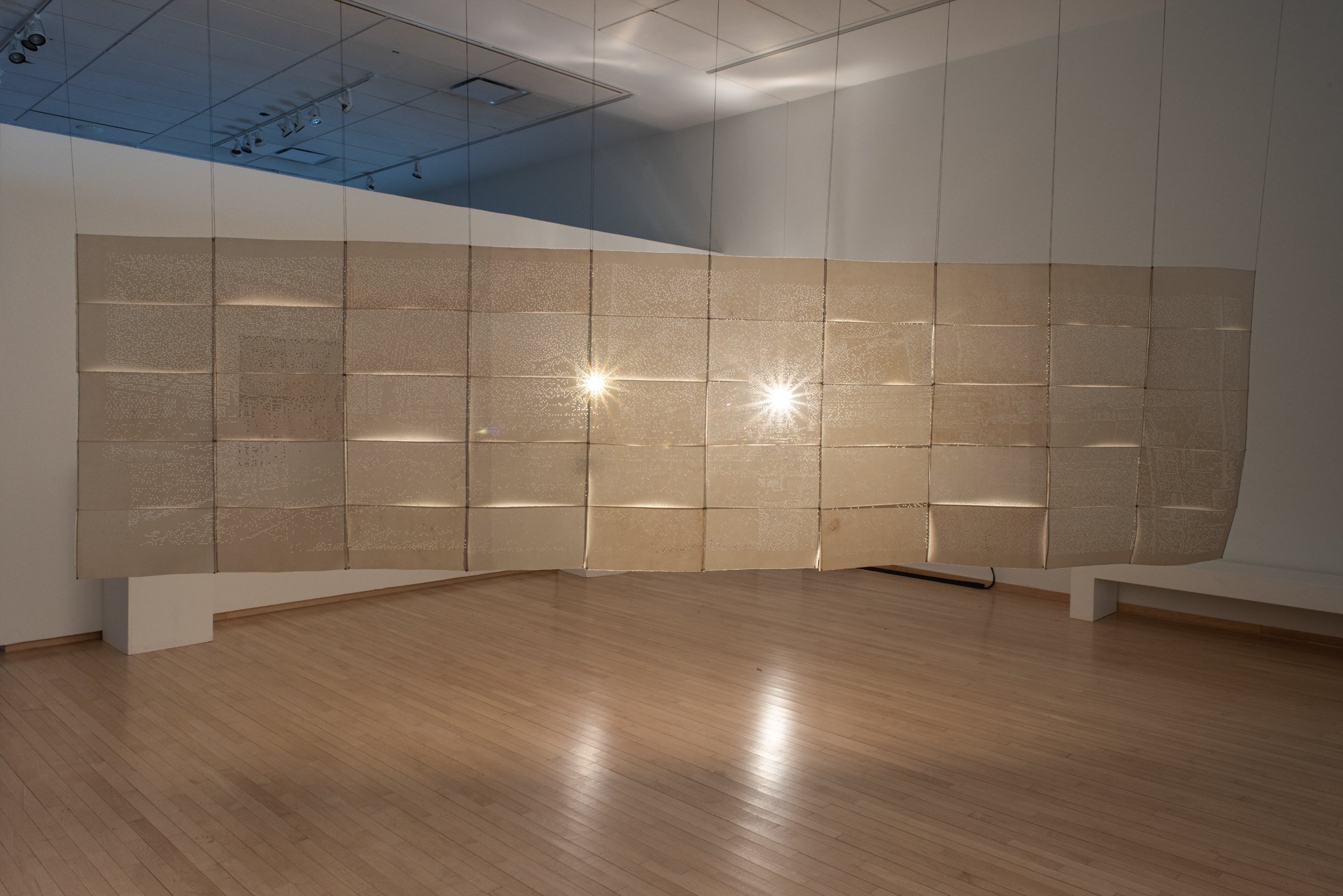 "Babycamera Dream Boat,"
2025,
Perforated cotton paper, waxed linen thread, overhead projectors.
4’ x 15’
Photo Credit: Neighboring States