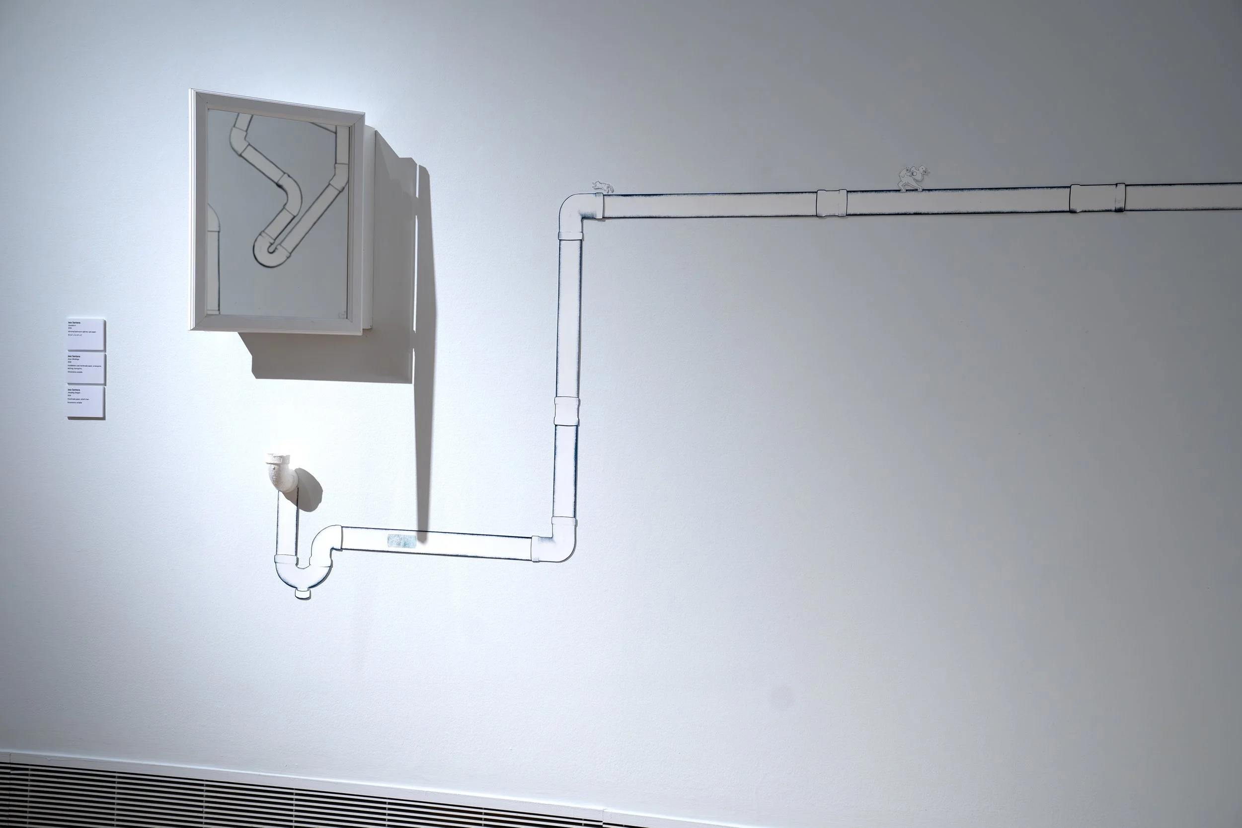 Jess Santana, 
Outside In, 
2026, 
Mirrored bathroom cabinet, cast paper. 
19 1/4" x 15 1/4" x 5" 