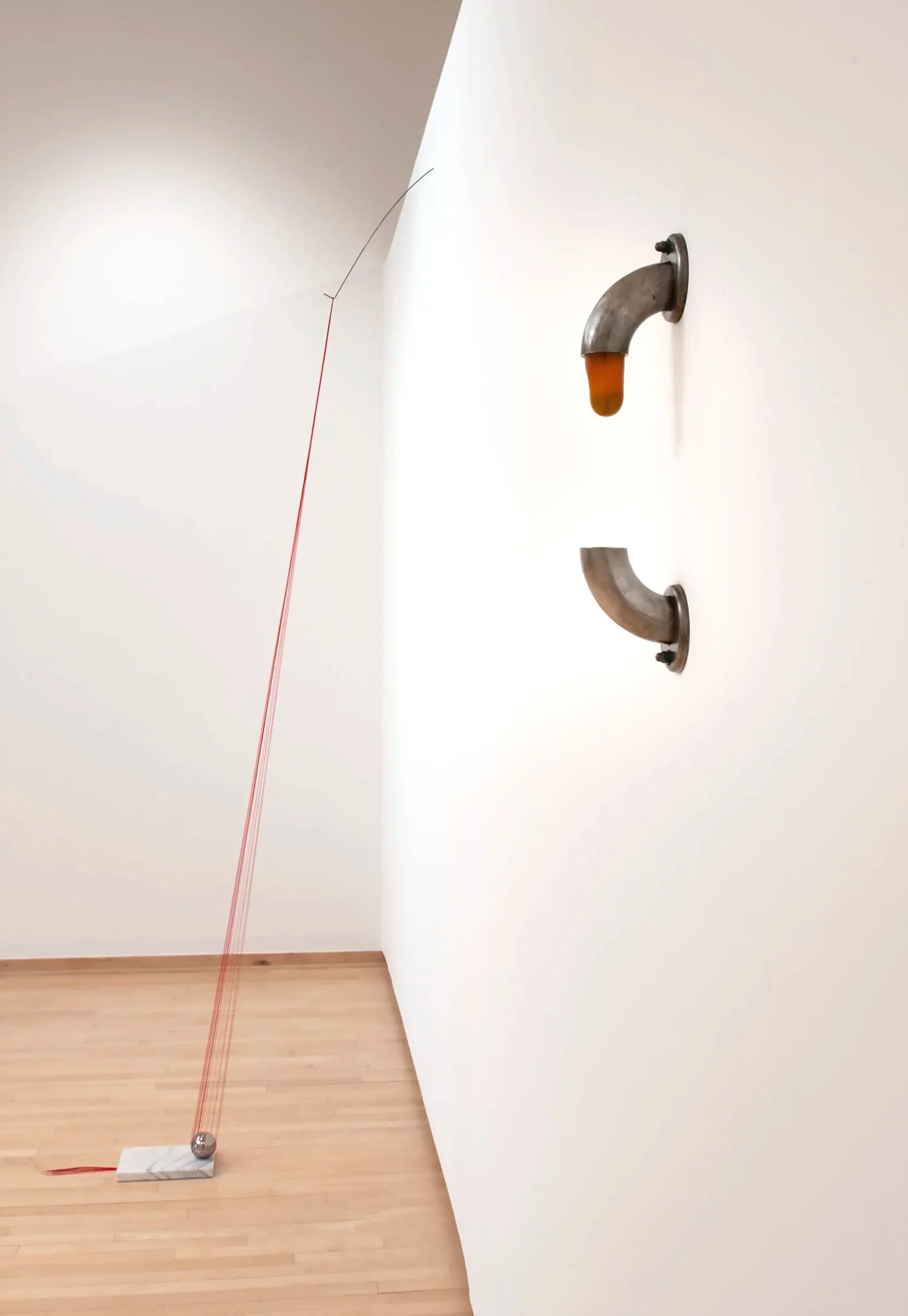 Untitled (Battery)
Installation View.
Steel, Spider-Tack, bearing ball, gravity. ~4”×24"×5"
"Sunk Cost"
Installation View.
Nylon, marble, steel. ~7”×102”×30" Photo Credit: John Carlano