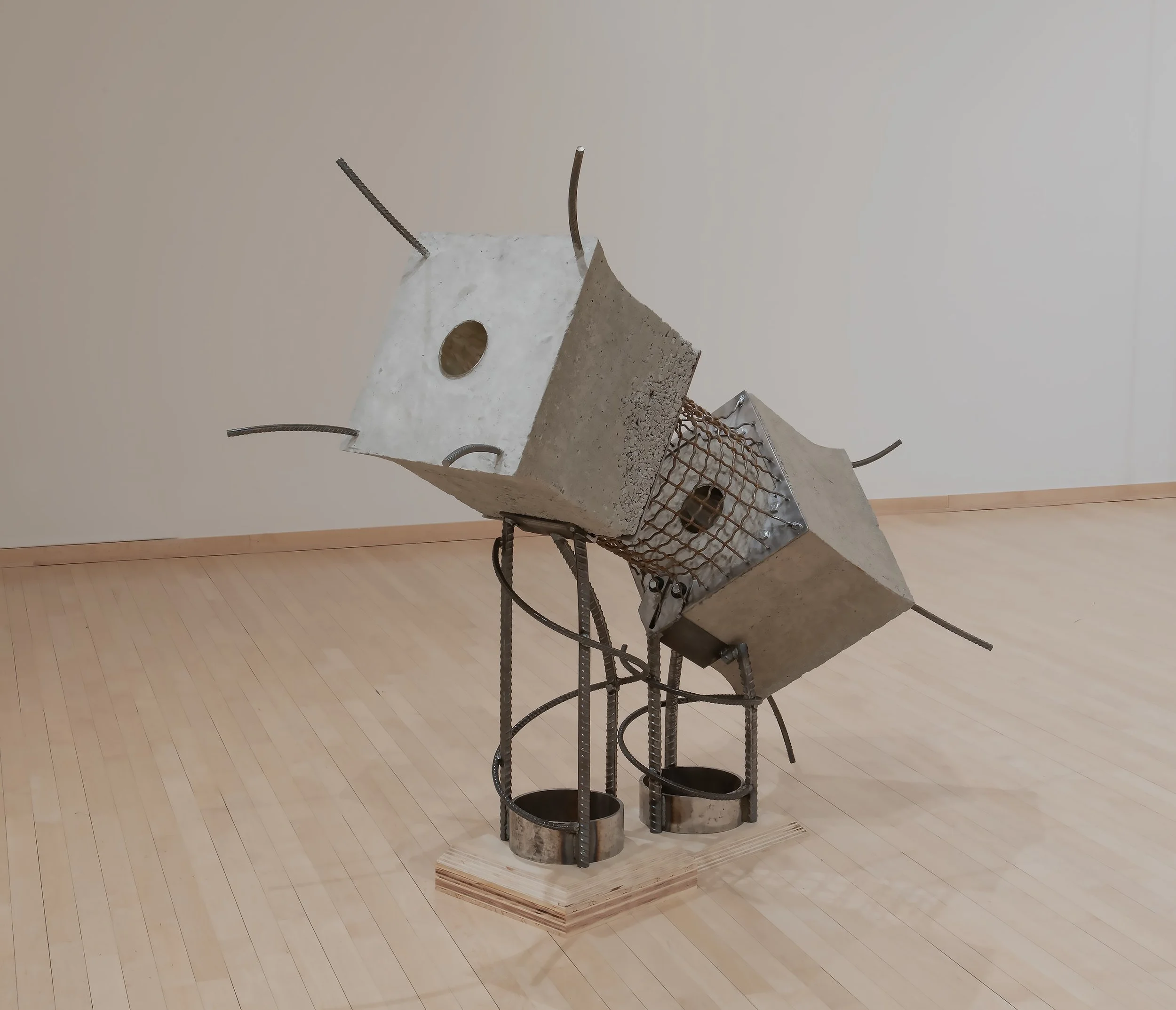 "Al Centro, Pá Dentro,"  

Concrete, rebar, steel, wood and glass, 

72”x32”x55”, 

Photo Credit Johno Carlano 