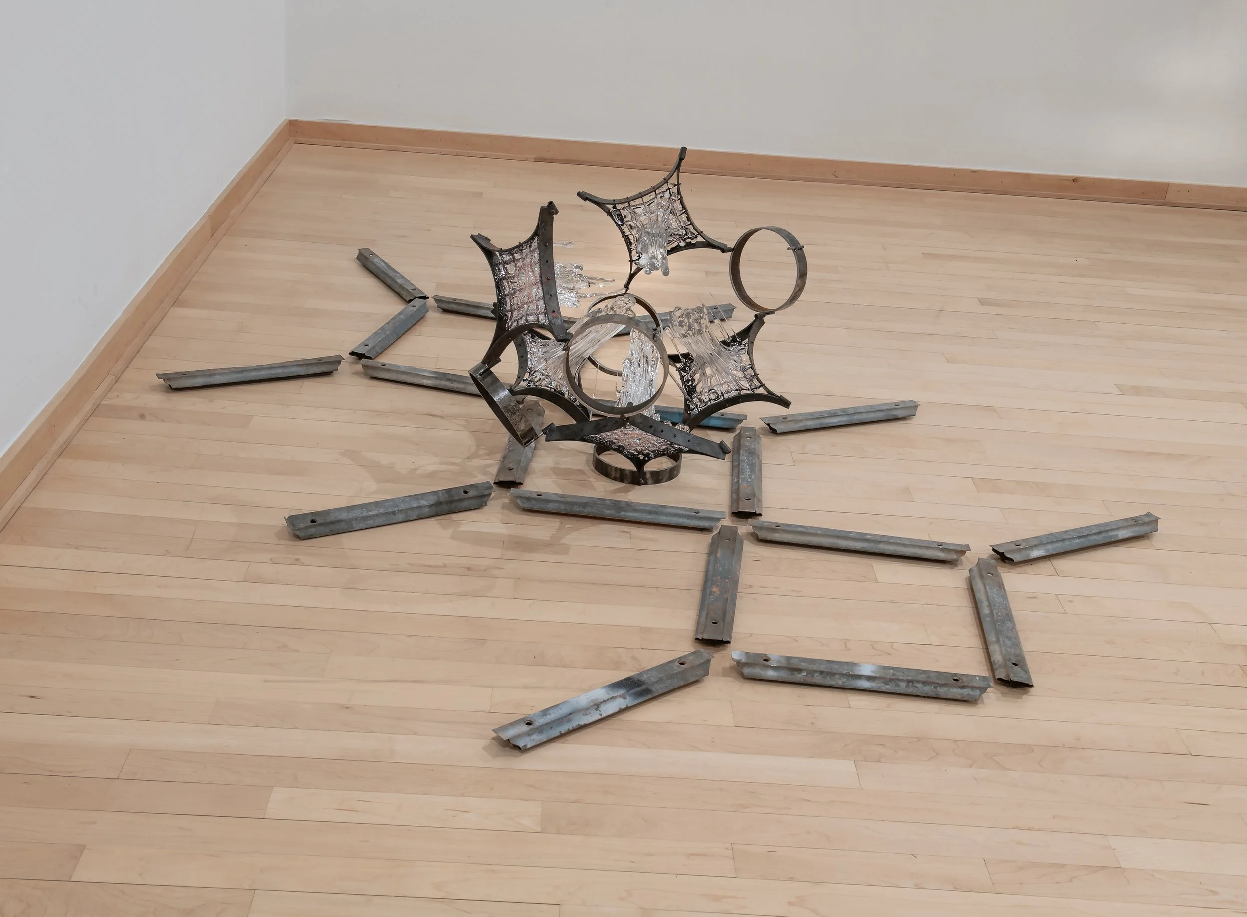 "Centripetal Split/Field of Framers,"

Glass, copper and Steel/Galvanized grilles and retention bolts,

Photo Credit: John Carlano 