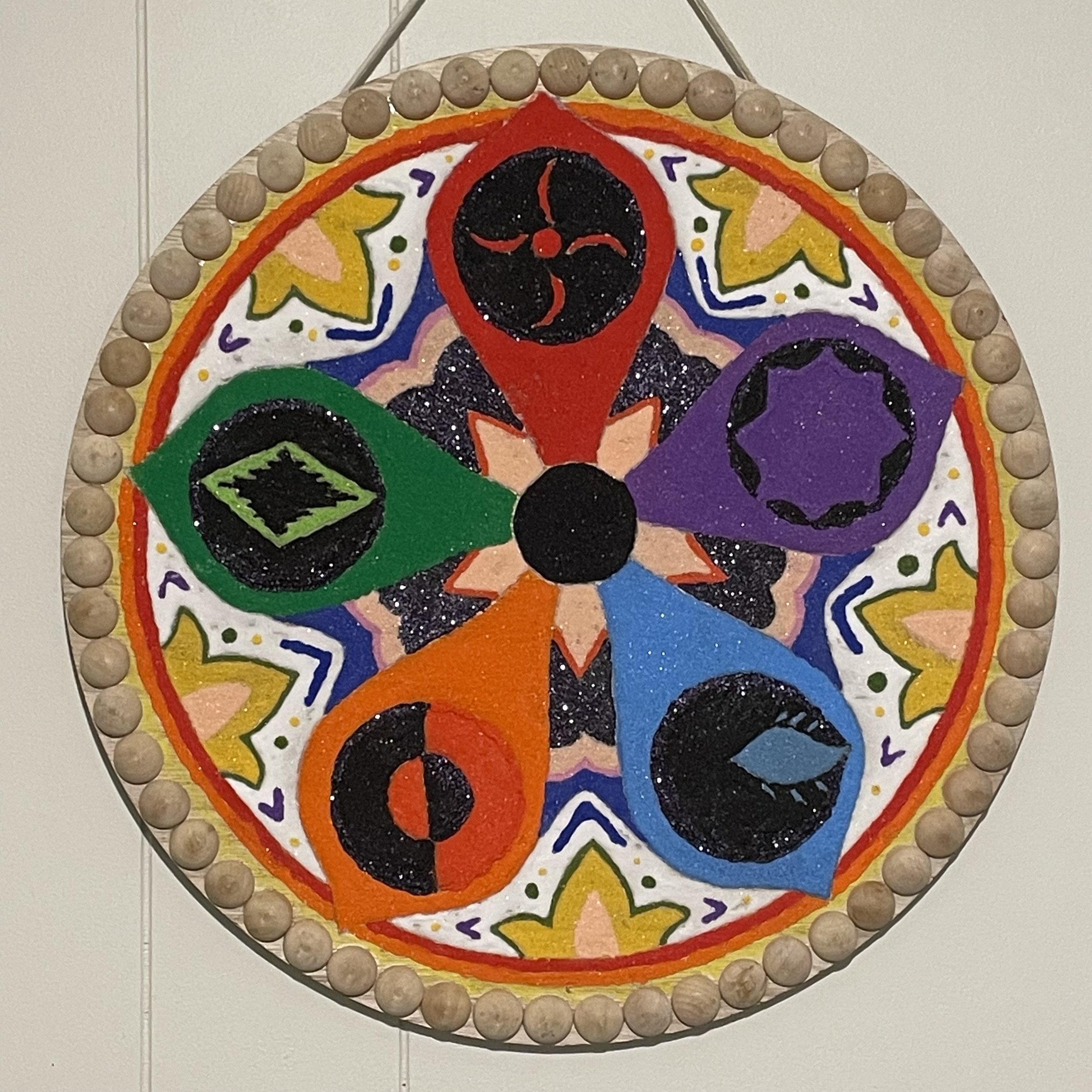 Mari Mandala, 2024, Color sand and glue on wood panel