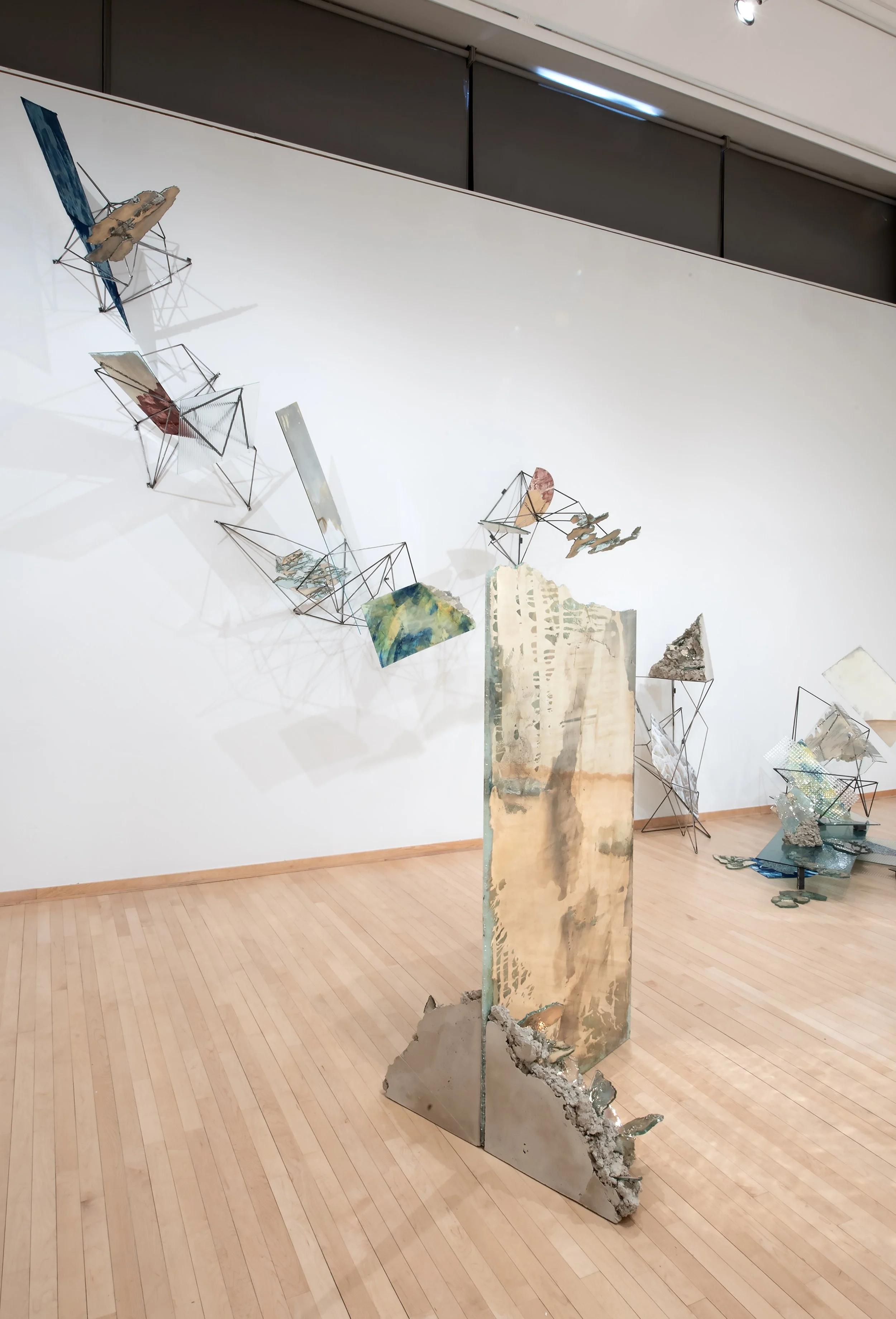 "Speculative Atlas" (detail) 

Installation: Reclaimed glass, silver, steel, concrete, mixed media painting on mylar, cyanotype on paper and silk, archival inkjet print, resin. 

Dimensions variable. Photo Credit: John Carlano