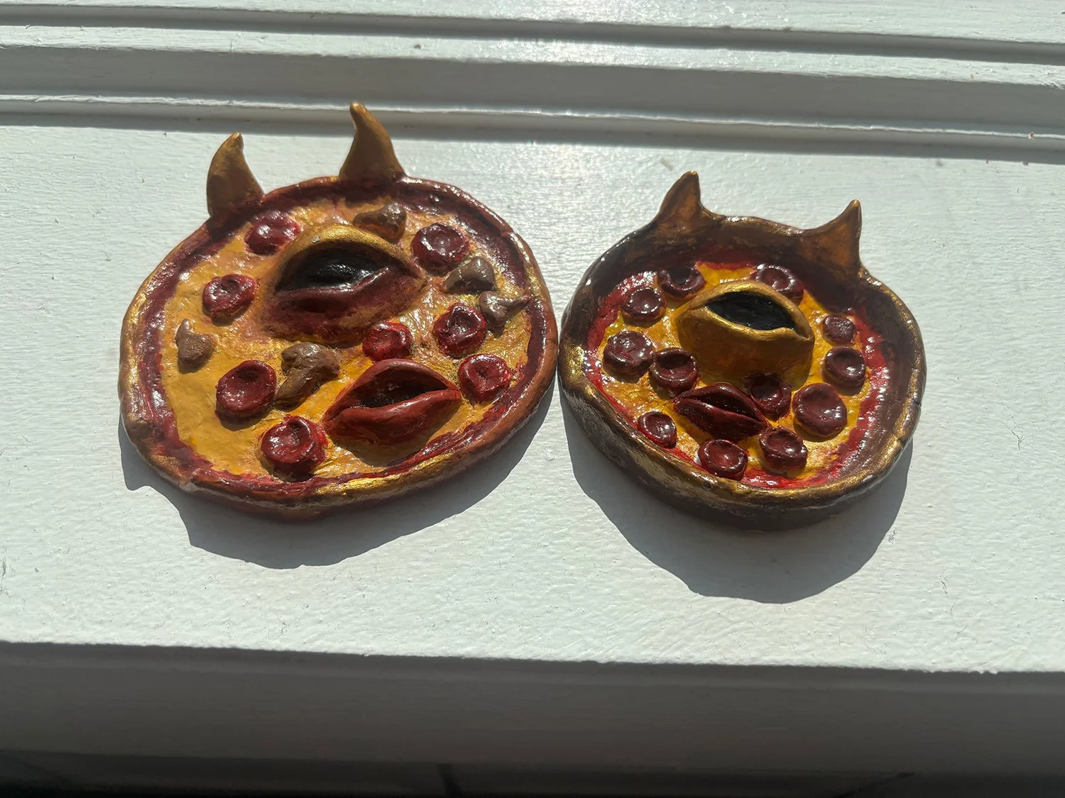 "Pizza Cravings" 2024, Clay and acrylic paint, 3" x 3"  