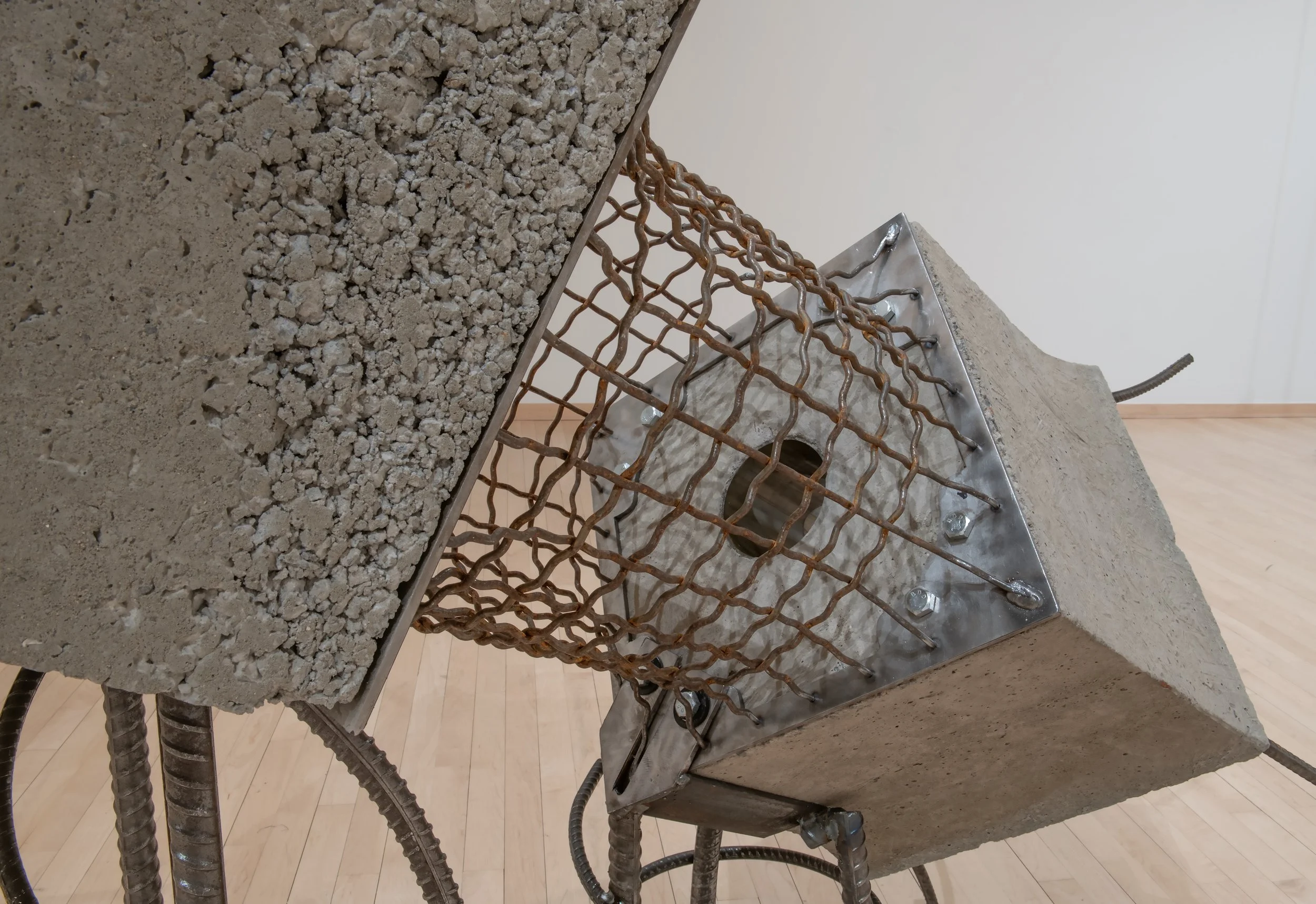 "Al Centro, Pá Dentro," (detail) 

Concrete, rebar, steel, wood and glass, 

72”x32”x55”, 

Photo Credit Johno Carlano 