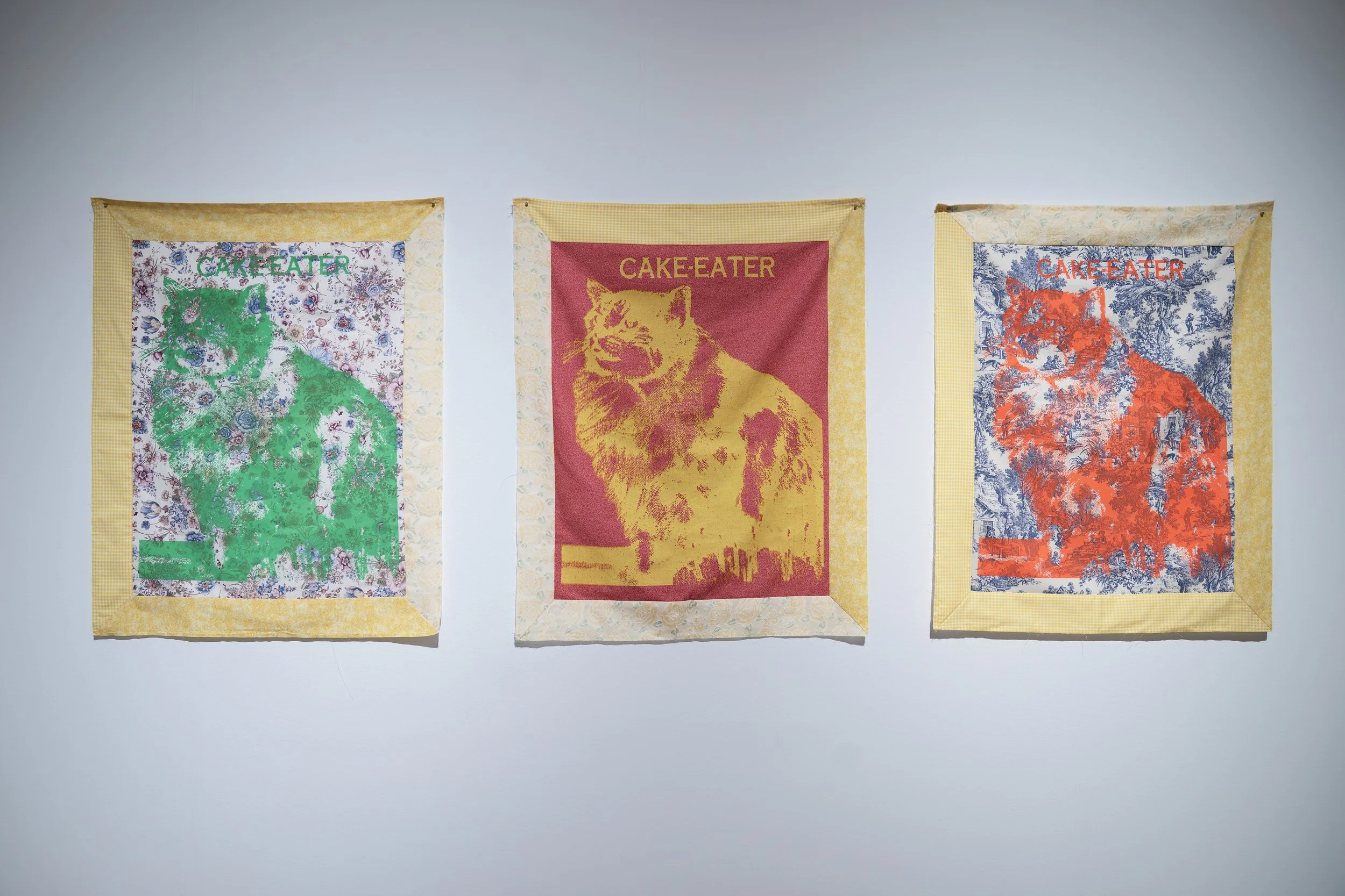 Joseph E. Malson, 
Cake Eaters, 
2026, 
Found fabric, acrylic ink, thread. 
32" x 24" 
