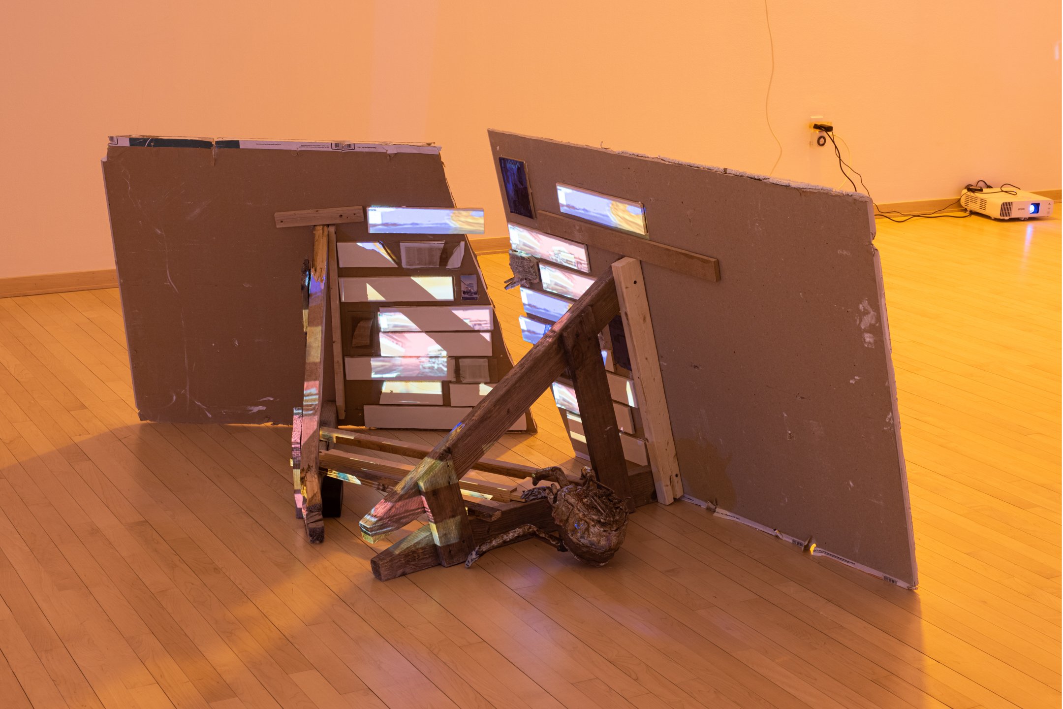 "Barricade"
Installation View
Reclaimed (drywall, ceramic, glass, sawhorses), projection
72”x 48” x36”
Photo Credit: Neighboring States