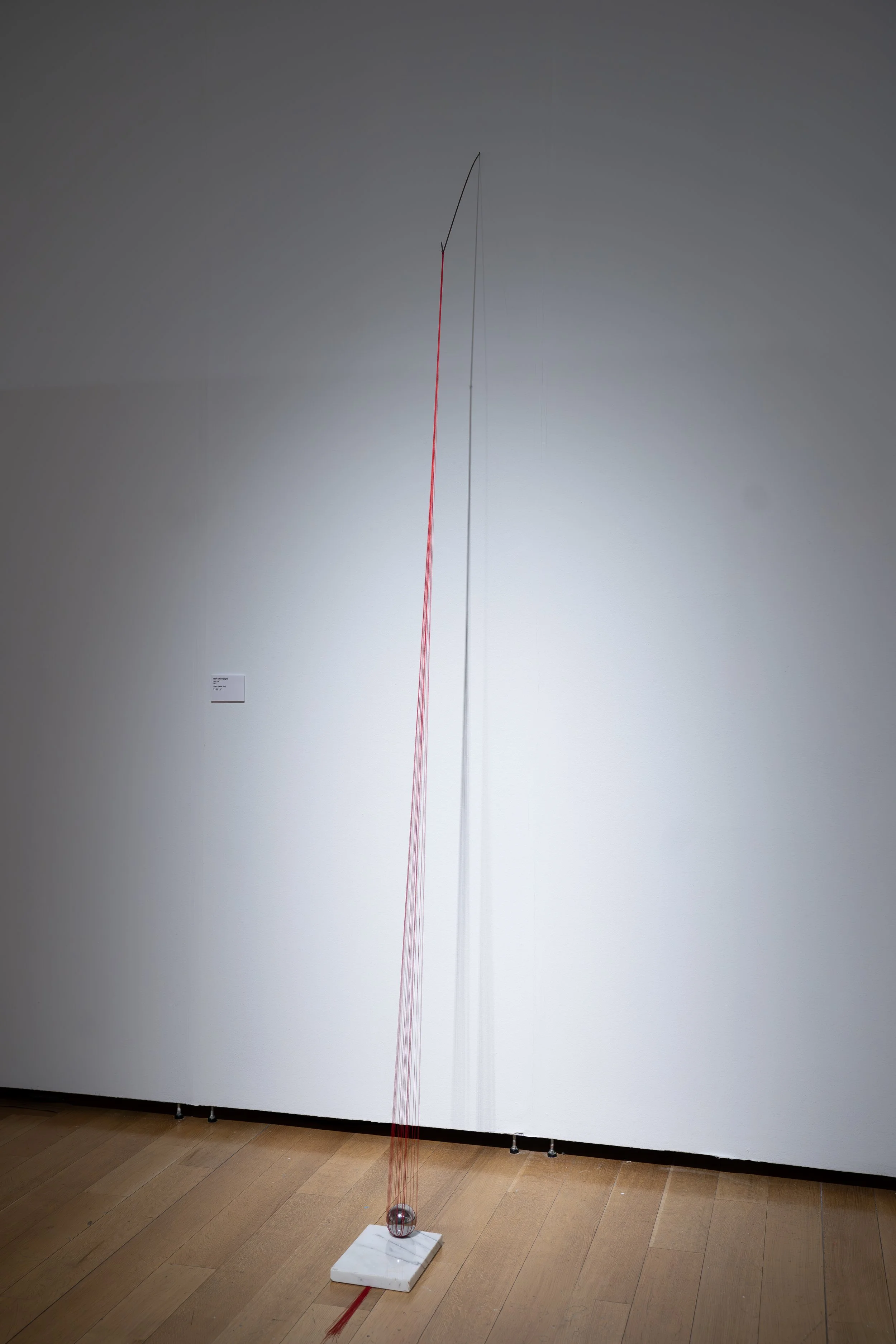Mary Champagne,
Sunk cost, 
2025, 
Nylon, marble, steel. 
7" x 102" x 30"