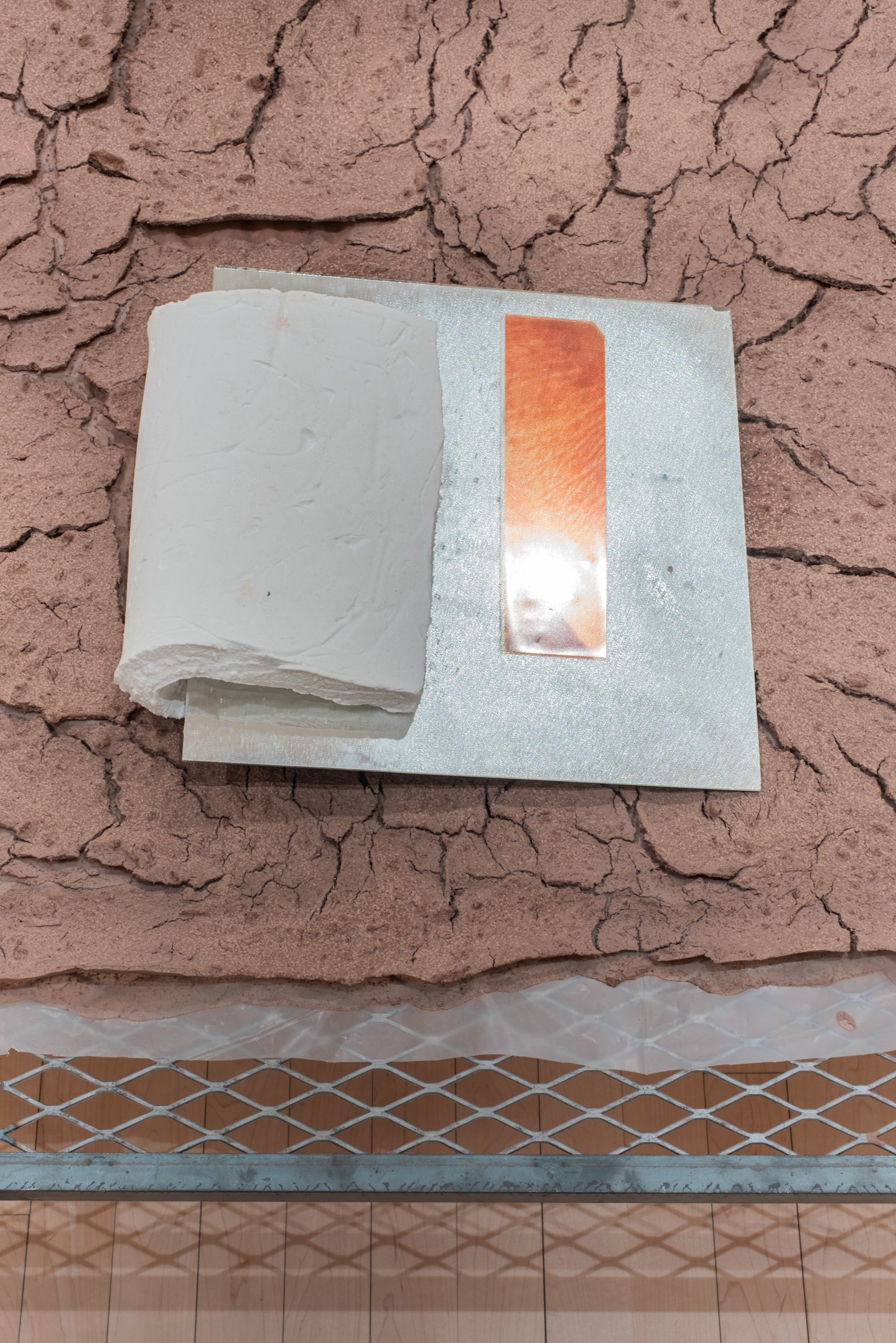 "Heat Upon Arrival (detail)" 2025,
Steel, wood, orange, plastic mesh, grapes, wax, marshmallow, mirror, laser image. Photo Credit: Neighboring States