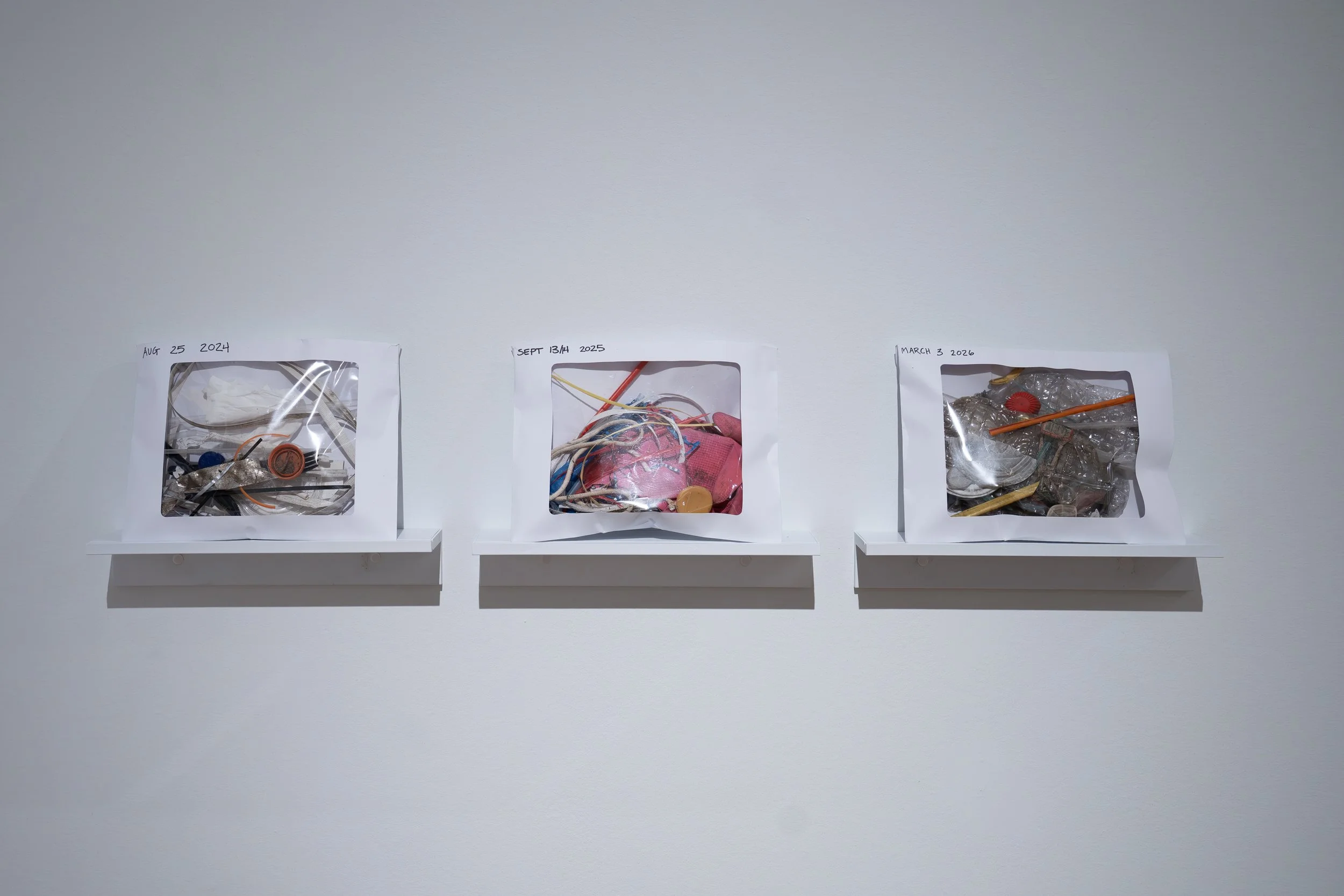 Jamie Cabreza, 
Found Object Archive, 
2026, 
Found objects; envelope with acetate window. 
8 1/2" x 12" x 1" 