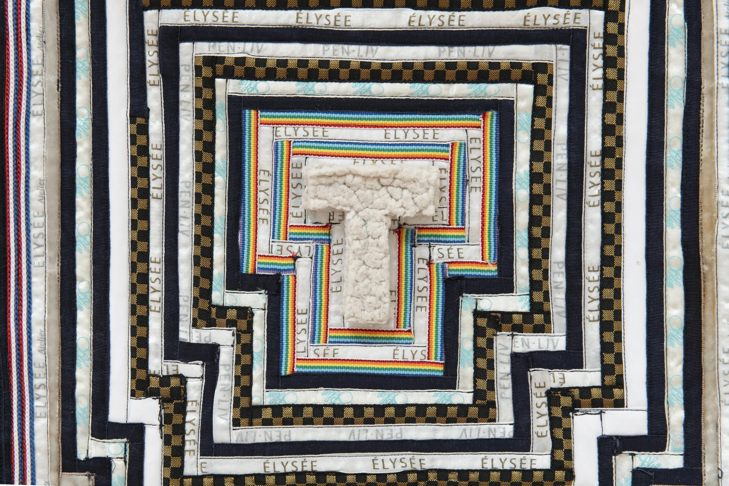 "Teeny" (detail)
tapes, trims, lanyards, shoelaces, and ribbons collected by artist; donation bin sherpa; athletic 
tape frame stuffed with batting scraps; copious amounts of glue. 60” x 62”. Photo Credit: John Carlano