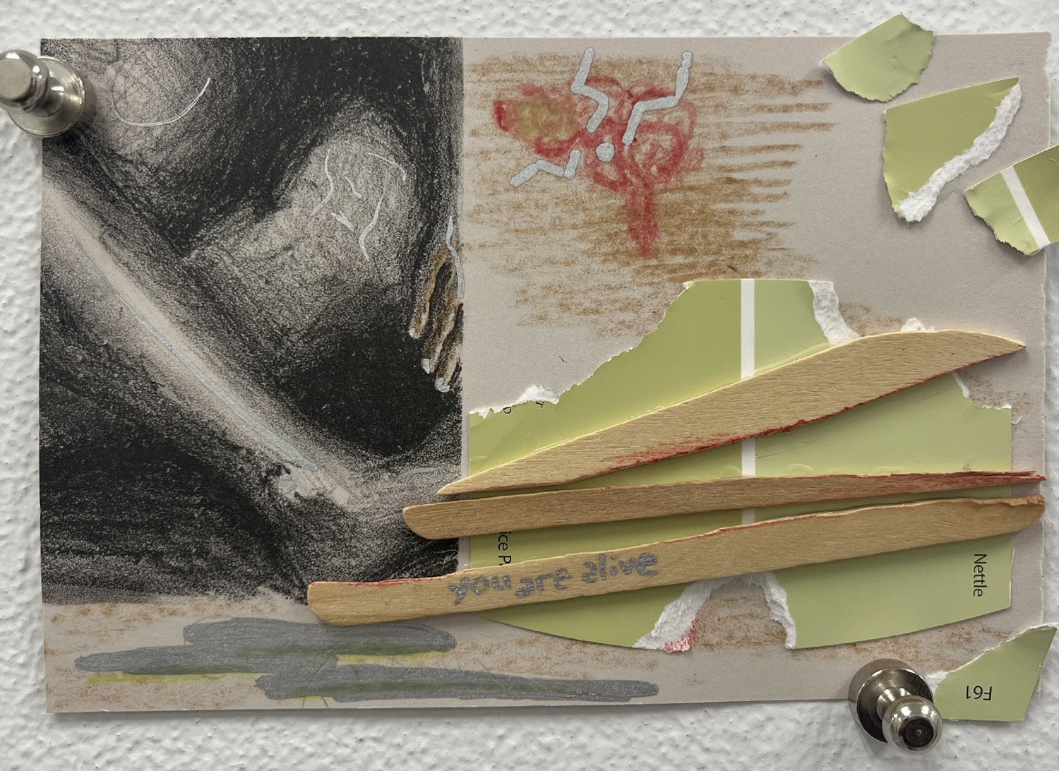 Visual Note 8: “Attack on the Amygdala”, 2024, recycled paper, crayon, marker, popsicle sticks, 4” x 6”