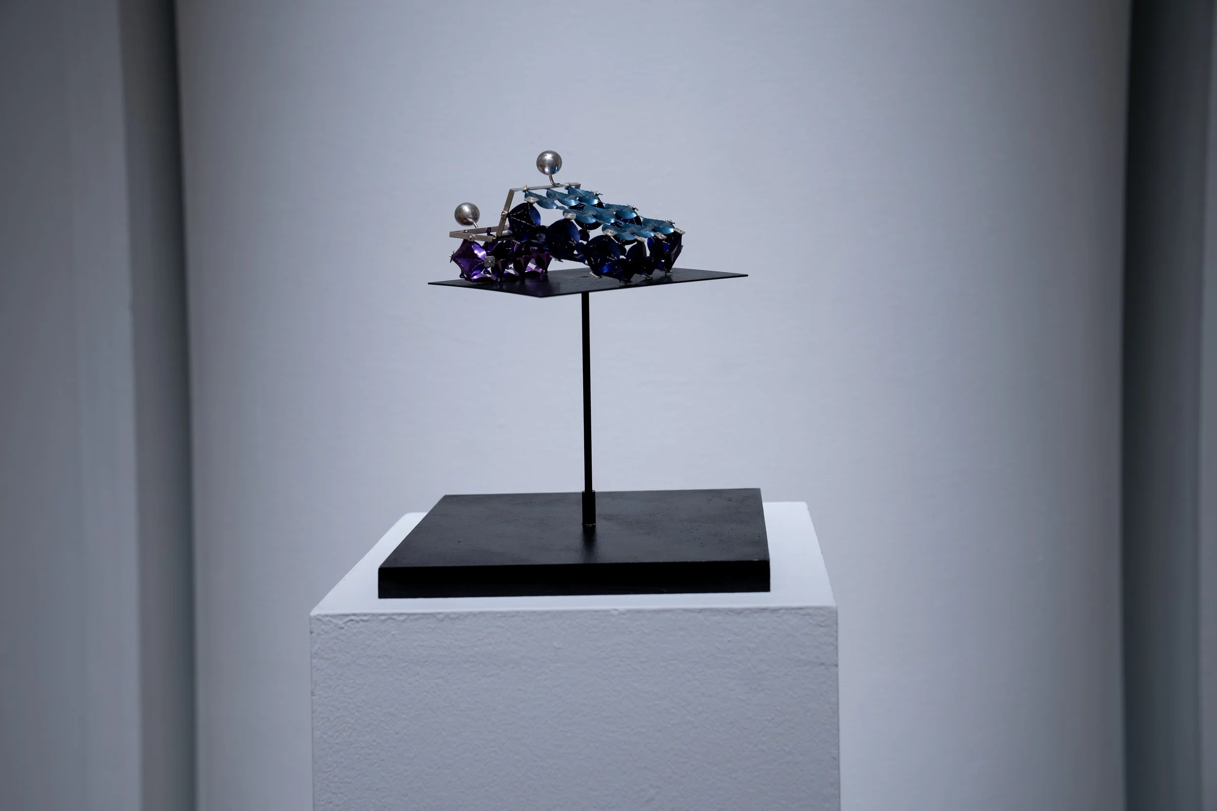 Weiwei Li, 
Box Pouch,
2025, 
Titanium, sterling silver. 
3 1/2" x 1 1/2" x 5 1/2" 