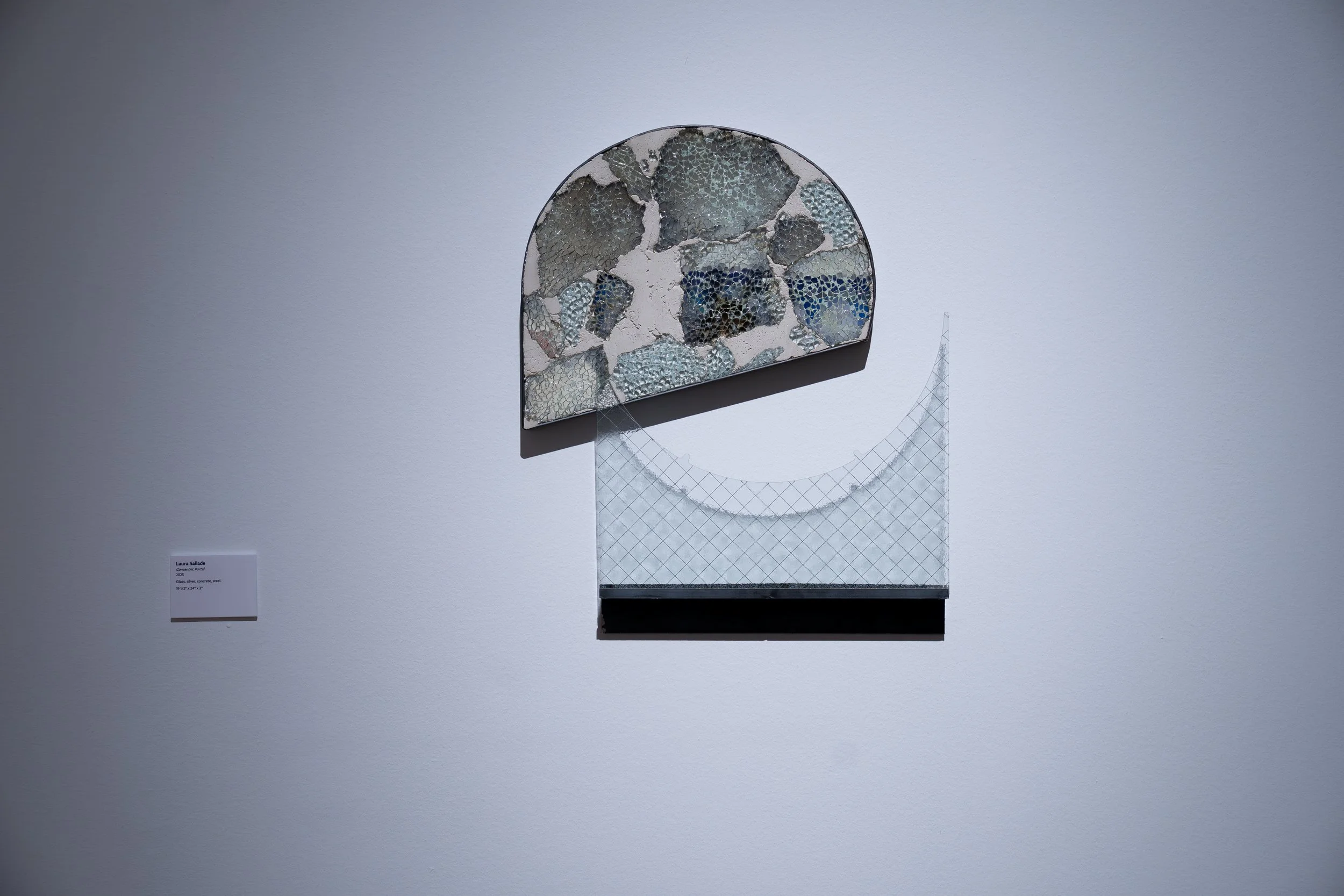 Laura Sallade, 
Concentric Portal, 
2025,
Glass, silver, concrete, steel. 
19 1/2" x 24" x 2"   