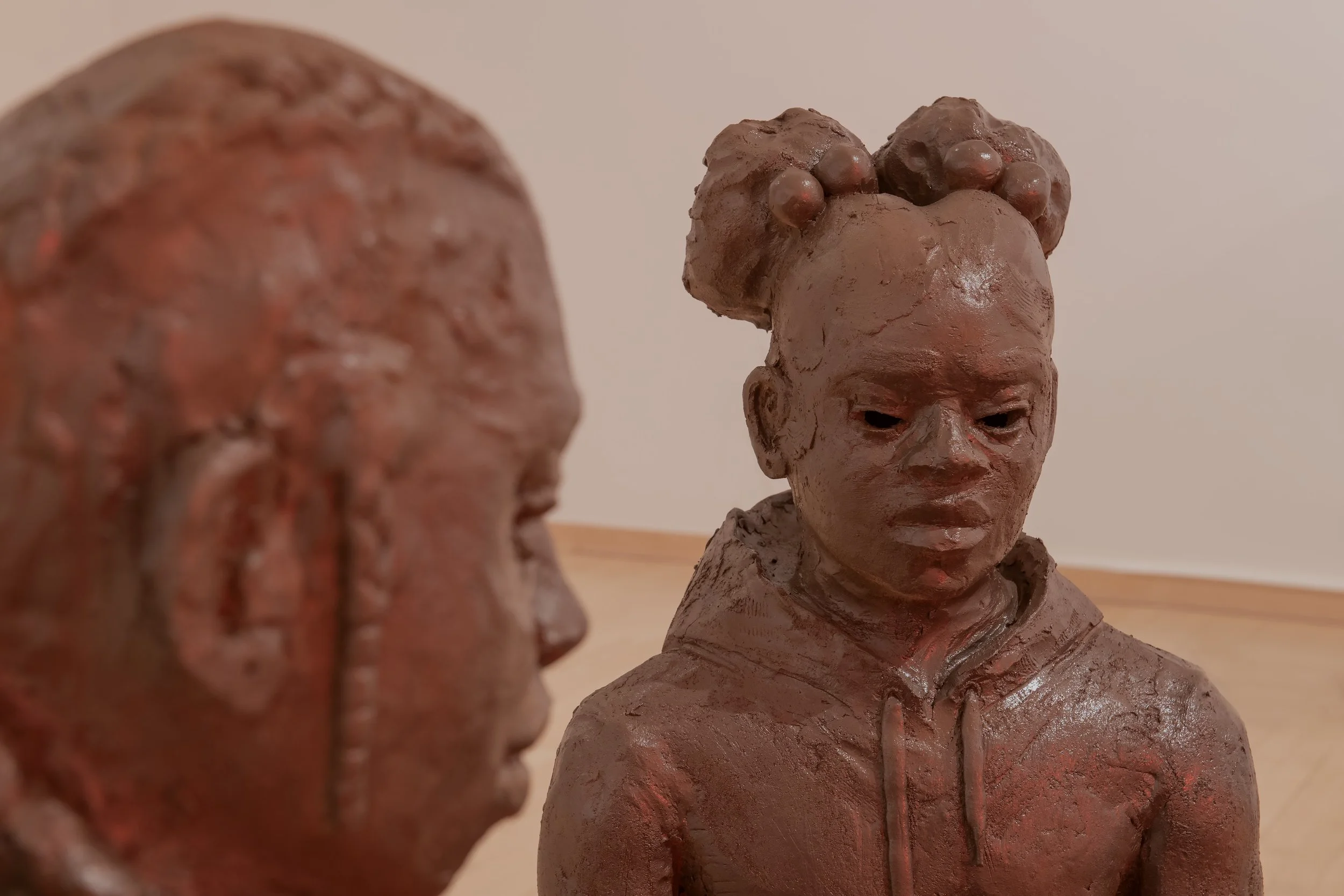 "Those abandoned lots for sale...," (detail) Installation, stoneware, porcelain, locally dug clay (Temple University Campus), mudcloth fabric (cotton, black tea & locally dug clay), kiln-cast glass and bricks, 48" by 48" by 36" Photo Credit: John Car