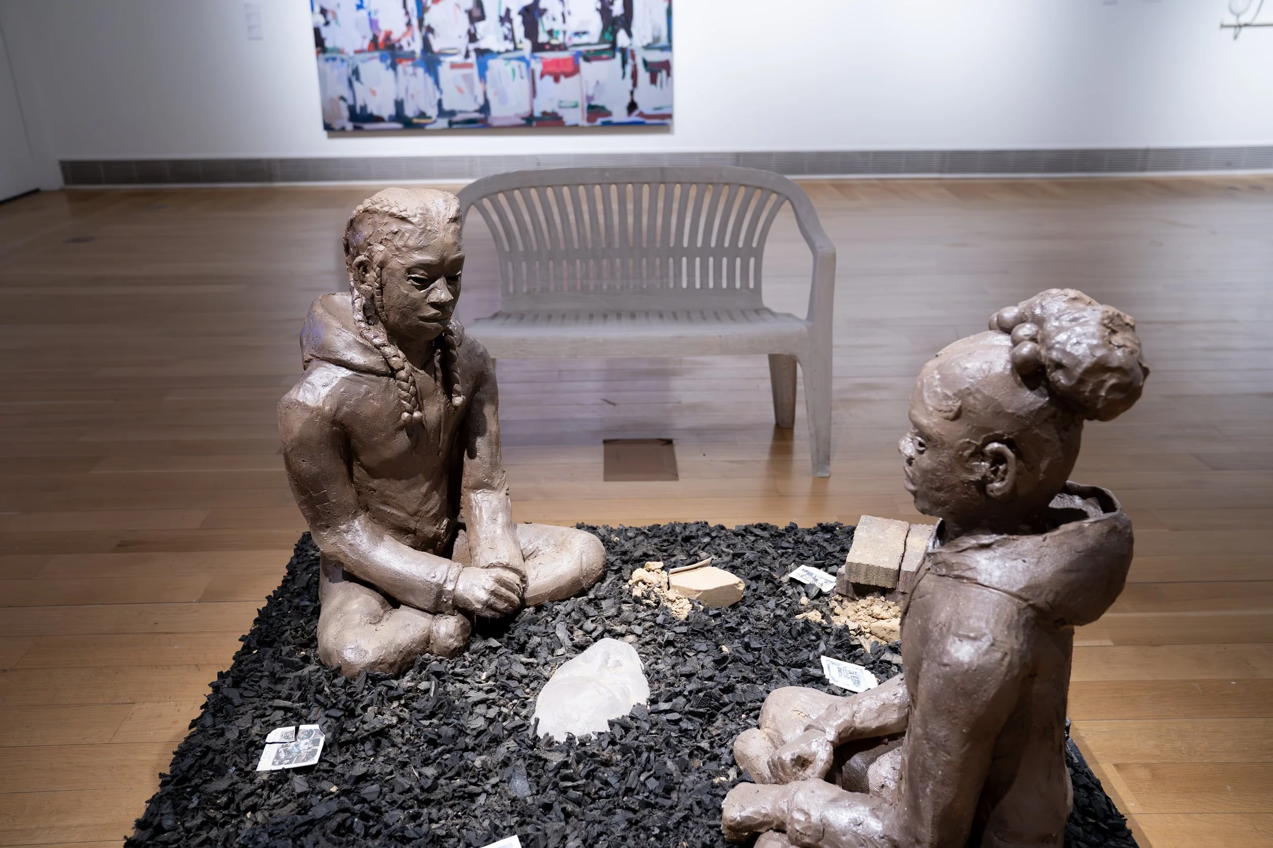 Marcè Nixon-Washington, 
Those abandoned lots for sale... 
2026, 
Stoneware, porcelain, locally dug clay (Temple  
University Campus), mudcloth fabric (cotton,  
black tea, and locally dug clay), kiln-cast glass,  
bricks. Image reference: Heinz Hist