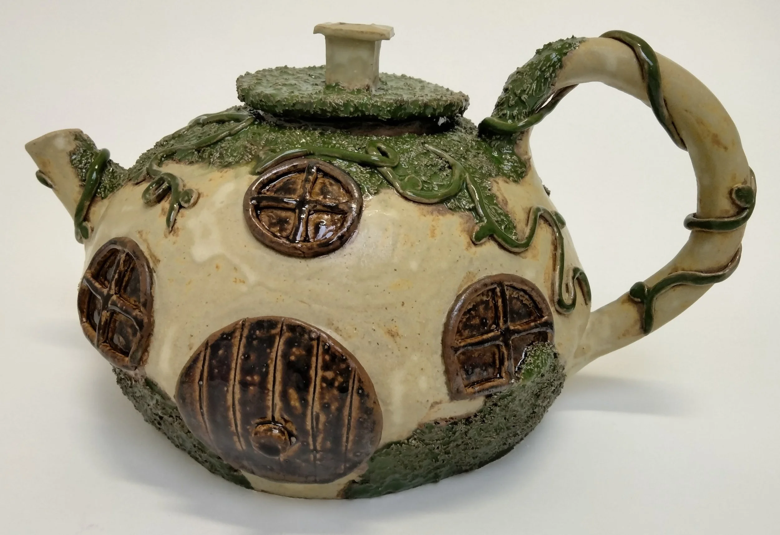 "Cozy and Warm" 2023, glazed ceramic, 10”x10”