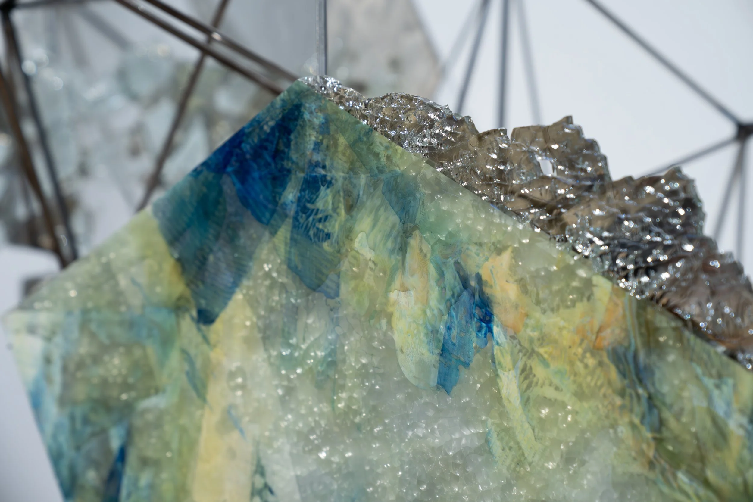 Laura Sallade, 
Mapping Occurrence, 
2026, 
Glass, silver, concrete, mixed-media paints,  
mylar, resin. 
Dimensions variable 