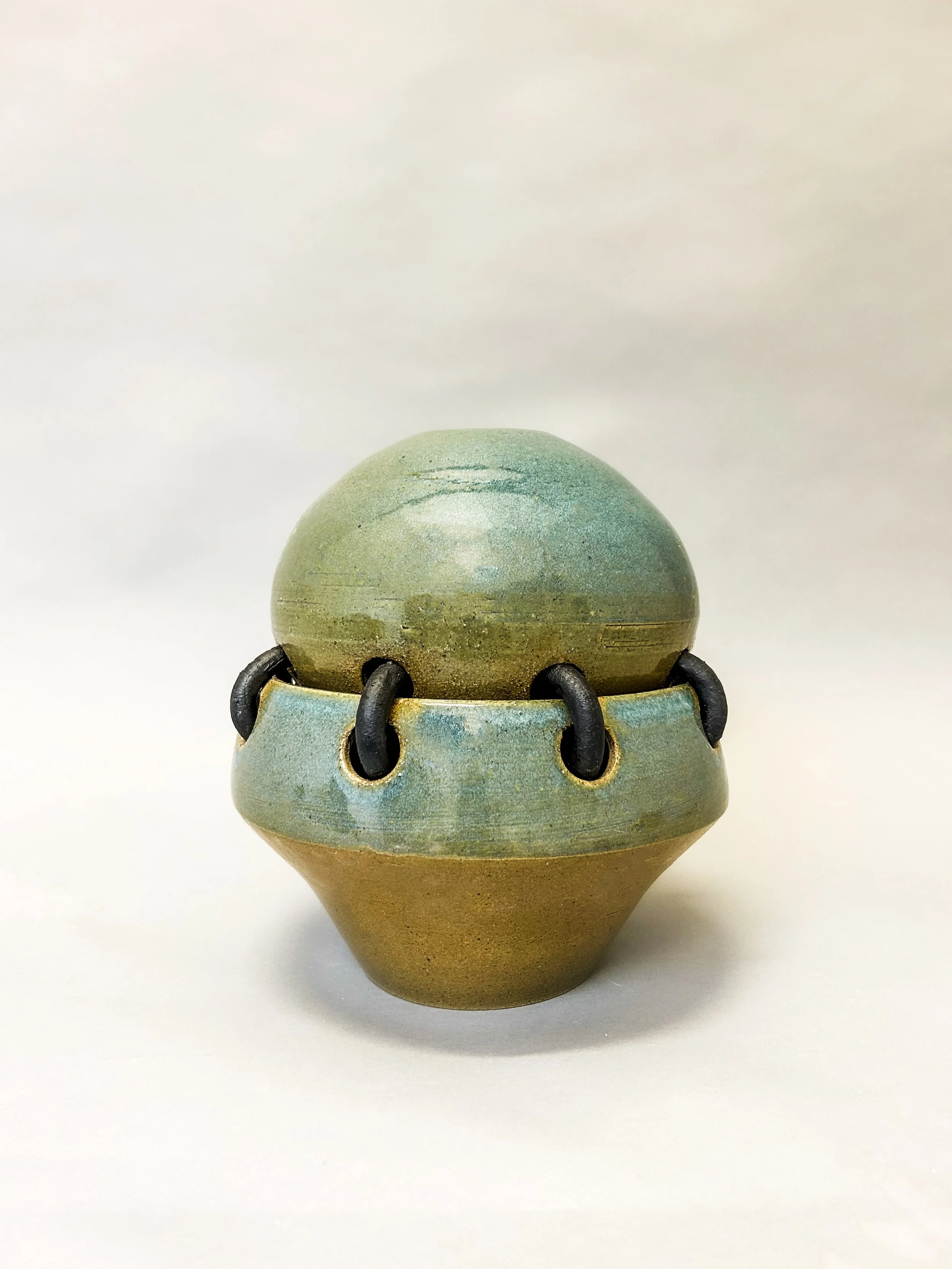 Linked Together, 1 of 2. March 2025. Ceramic. 9" x 12.5"