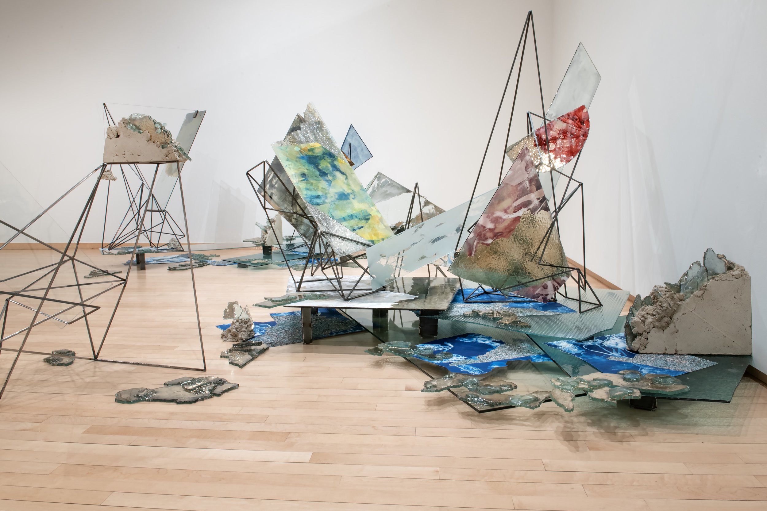 "Speculative Atlas" (detail) 

Installation: Reclaimed glass, silver, steel, concrete, mixed media painting on mylar, cyanotype on paper and silk, archival inkjet print, resin. 

Dimensions variable. Photo Credit: John Carlano