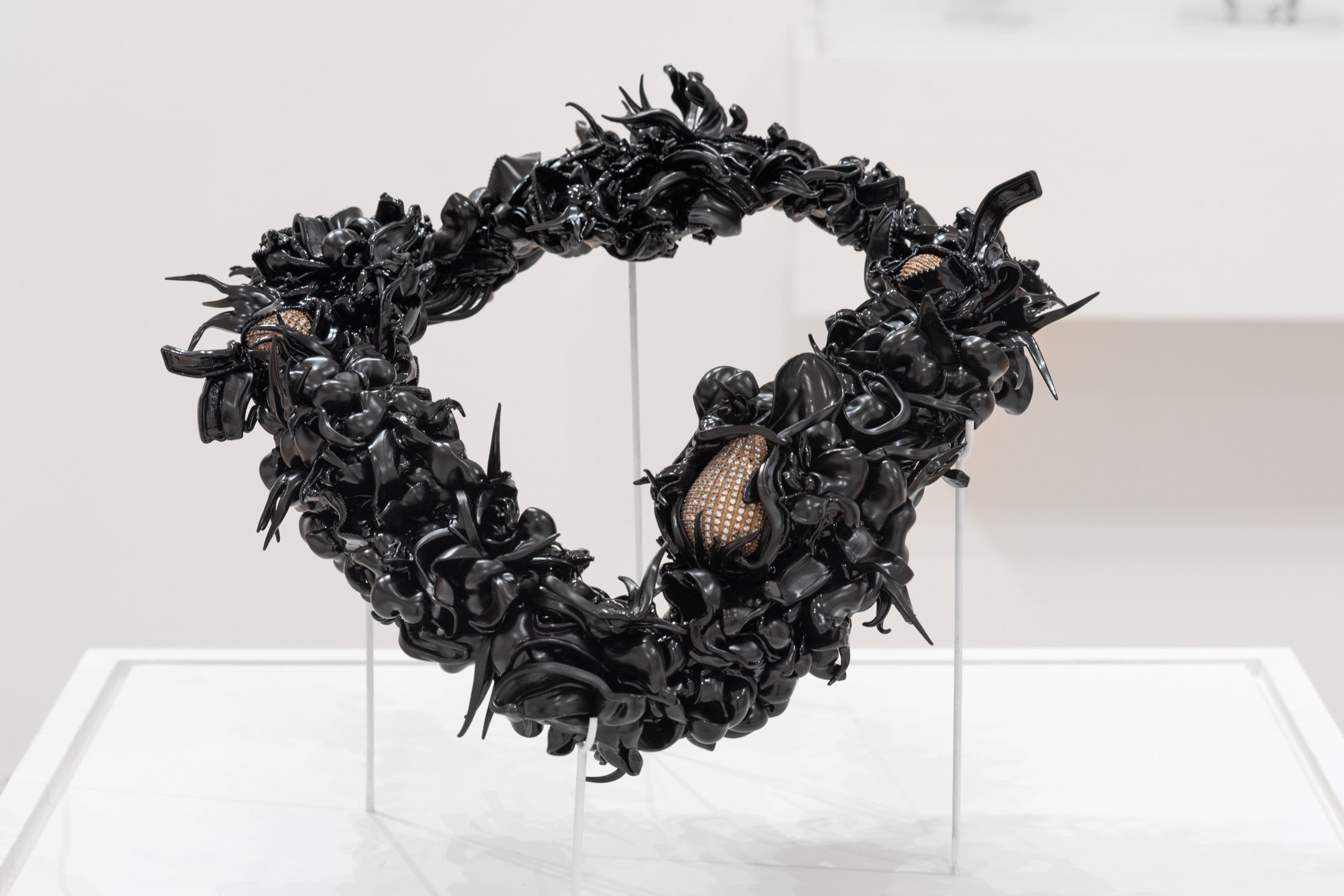 "LLingering Fossil 3," Necklace, Recycled plastic forks, Bronze, CZ, Casting, Stone setting, Plastic fabrication, 14" X 16" X 4" Photo Credit: Neighboring States