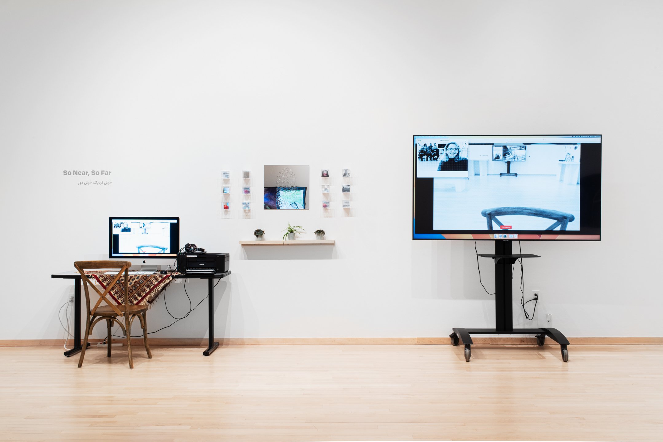 "So Near, So Far" 2025
Installation view. Interactive book, experimental narrative, web design, installation. Materials: acrylic, mirror, transparent film photos, pomegranate. Cube size: 3" x 3". Mirror panel: 17.5" x 18.5".
Photo credit: Neighborin