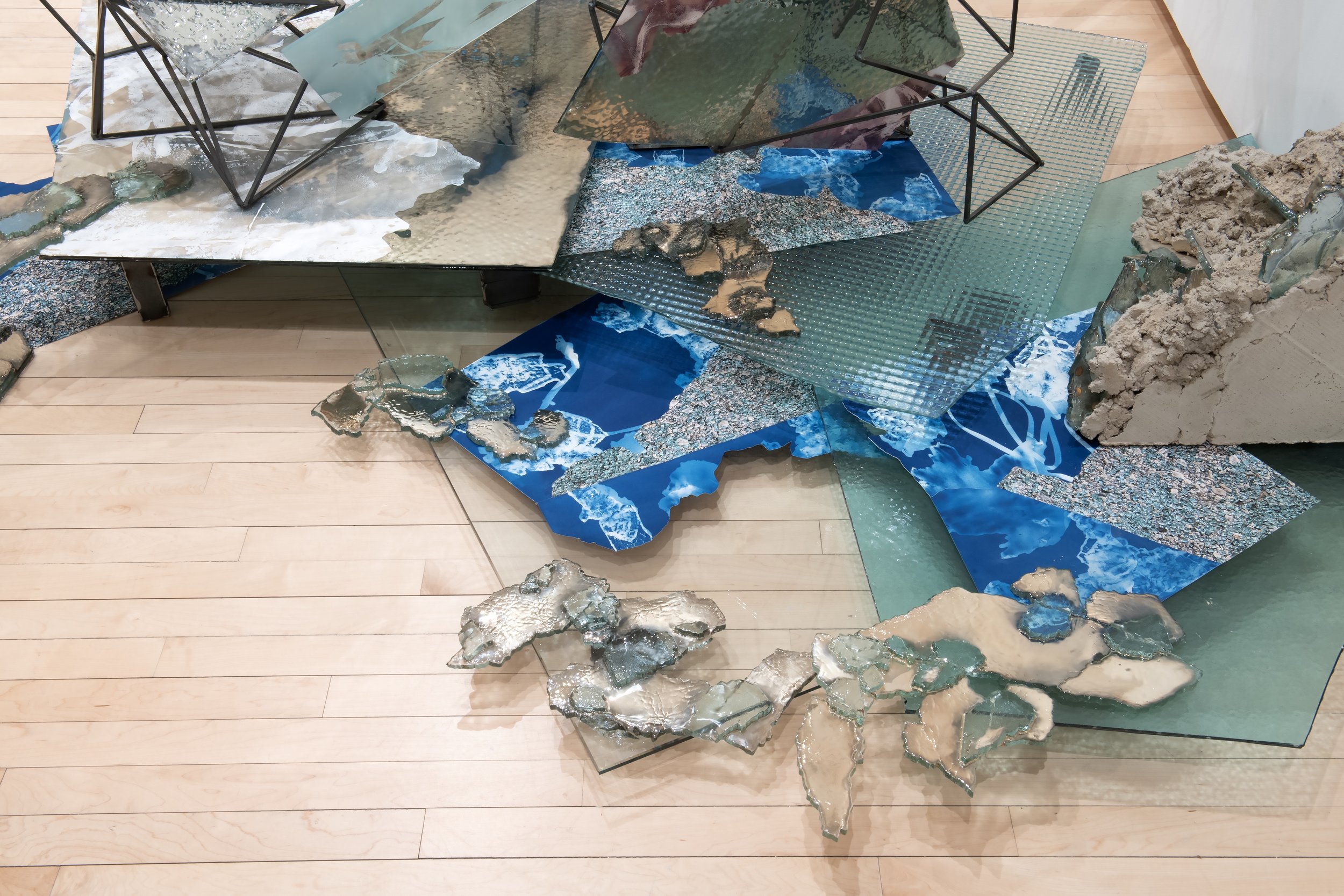 "Speculative Atlas" (detail) 

Installation: Reclaimed glass, silver, steel, concrete, mixed media painting on mylar, cyanotype on paper and silk, archival inkjet print, resin. 

Dimensions variable. Photo Credit: John Carlano