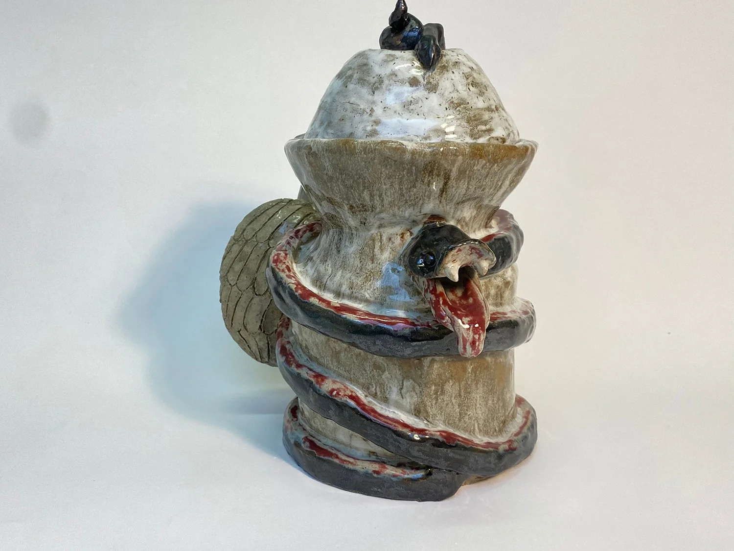 "A Snake’s Possession" 2023, Ceramic, 9" x 9.5" 