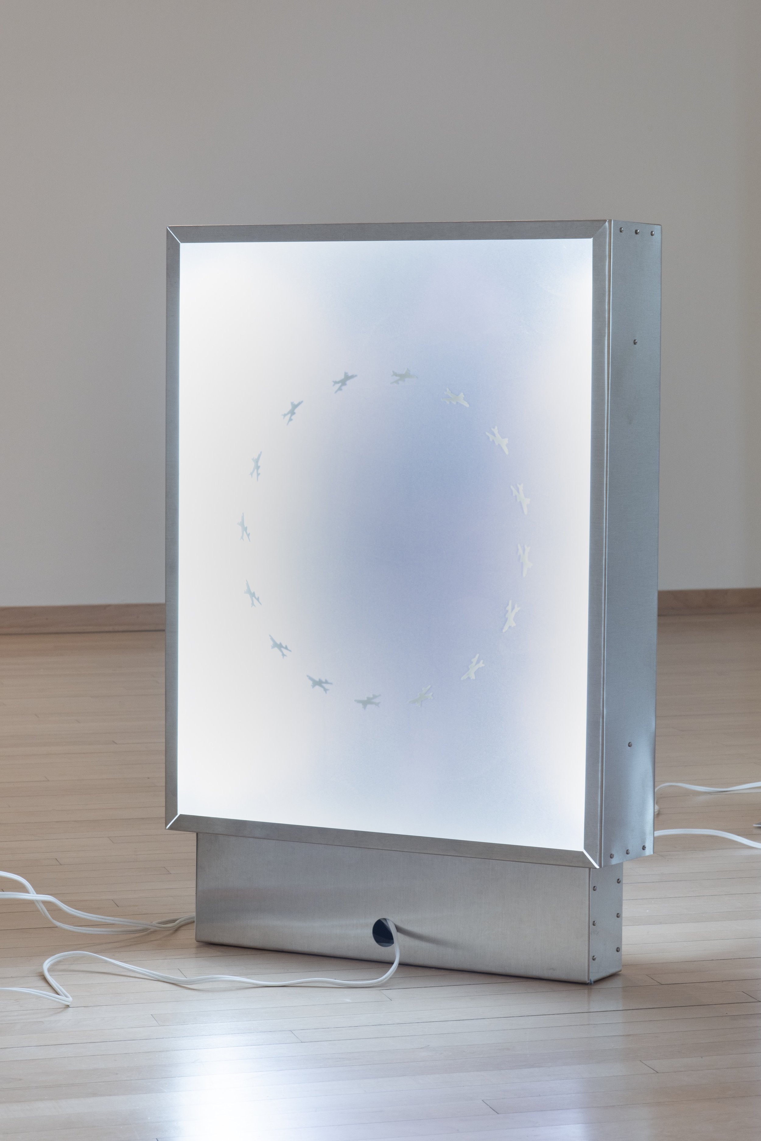 "Fatigue," Aluminum, plexiglass, LED tubes, machine screws, vinyl, extension cord. 22" x 5" 32", 2025, Photo Credit: Neighboring States