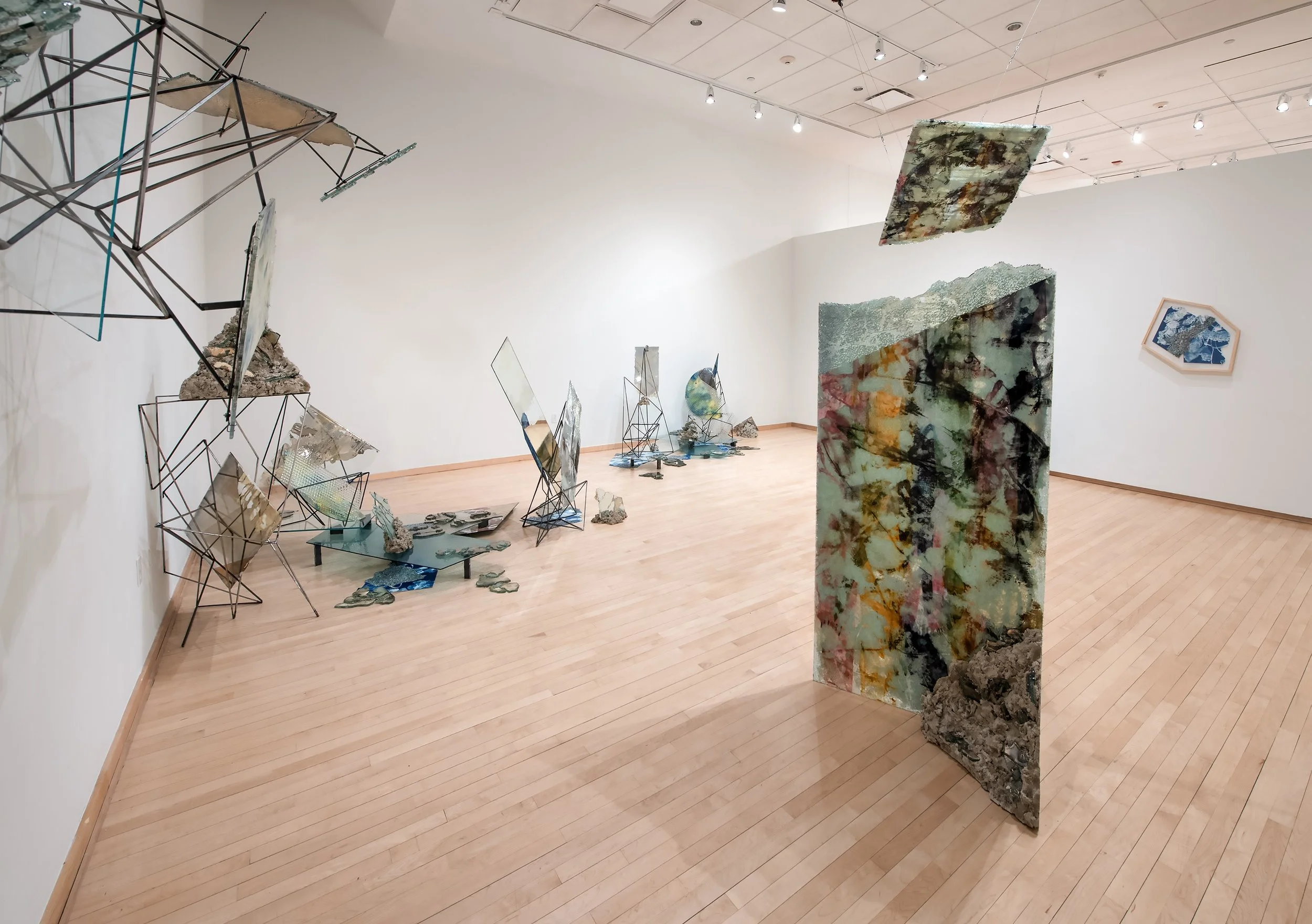 "Speculative Atlas"

Installation: Reclaimed glass, silver, steel, concrete, mixed media painting on mylar, cyanotype on paper and silk, archival inkjet print, resin. 

Dimensions variable. Photo Credit: John Carlano
