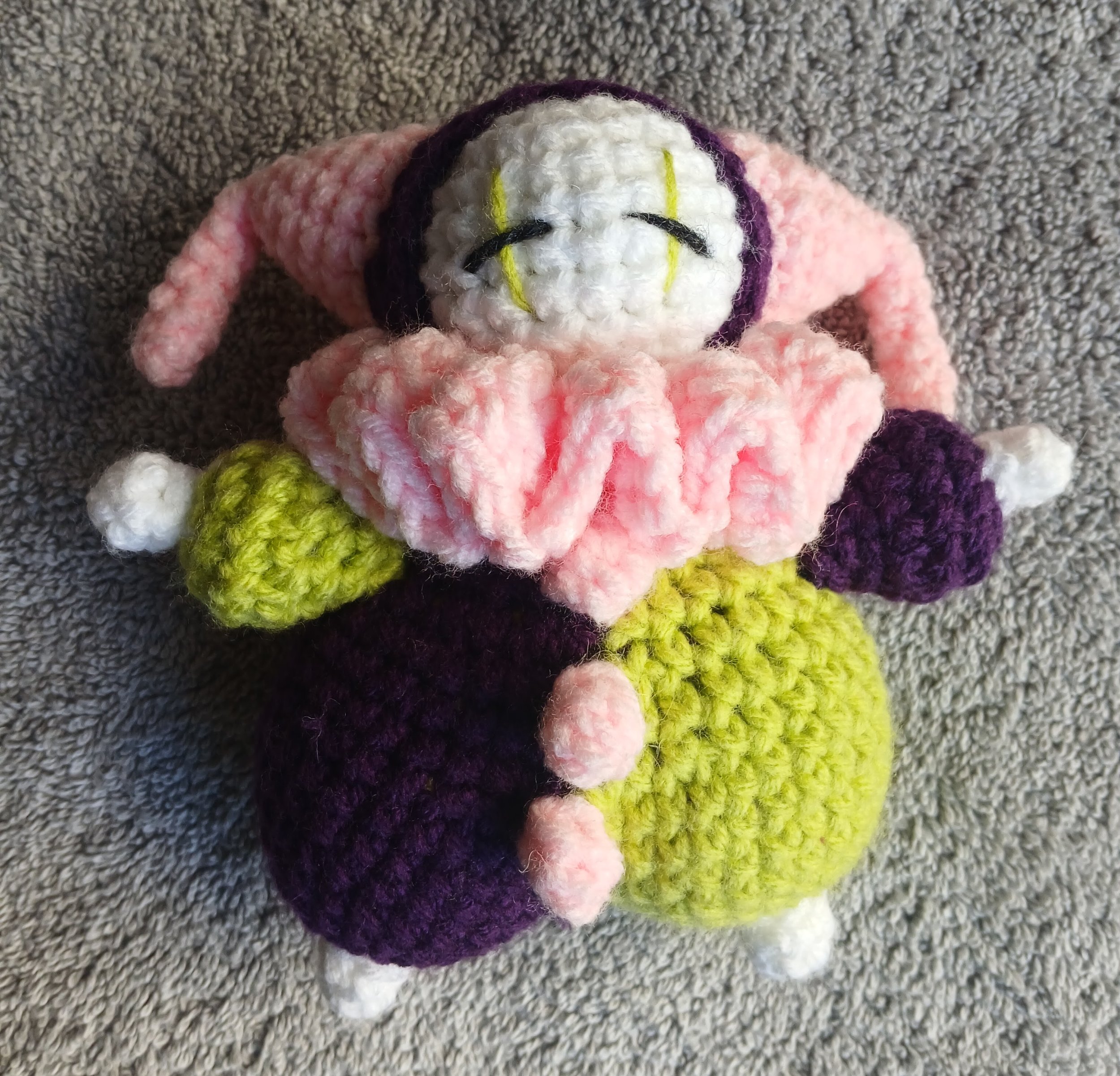 "Clown" 2025, acrylic yarn crochet, 4”x6"