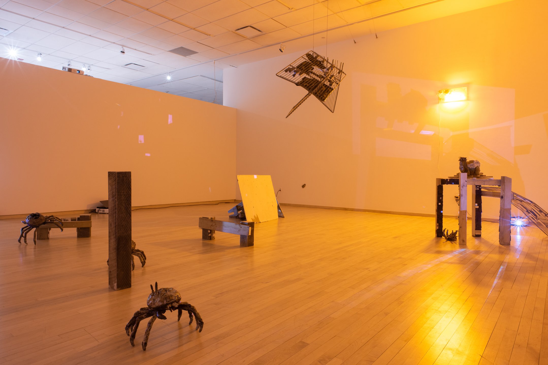"To What New Place,"
Installation View
Reclaimed, construction materials, ceramic, low-pressure sodium light, multi-channel projection and sound.
Dimensions Variable
Photo Credit: Neighboring States
