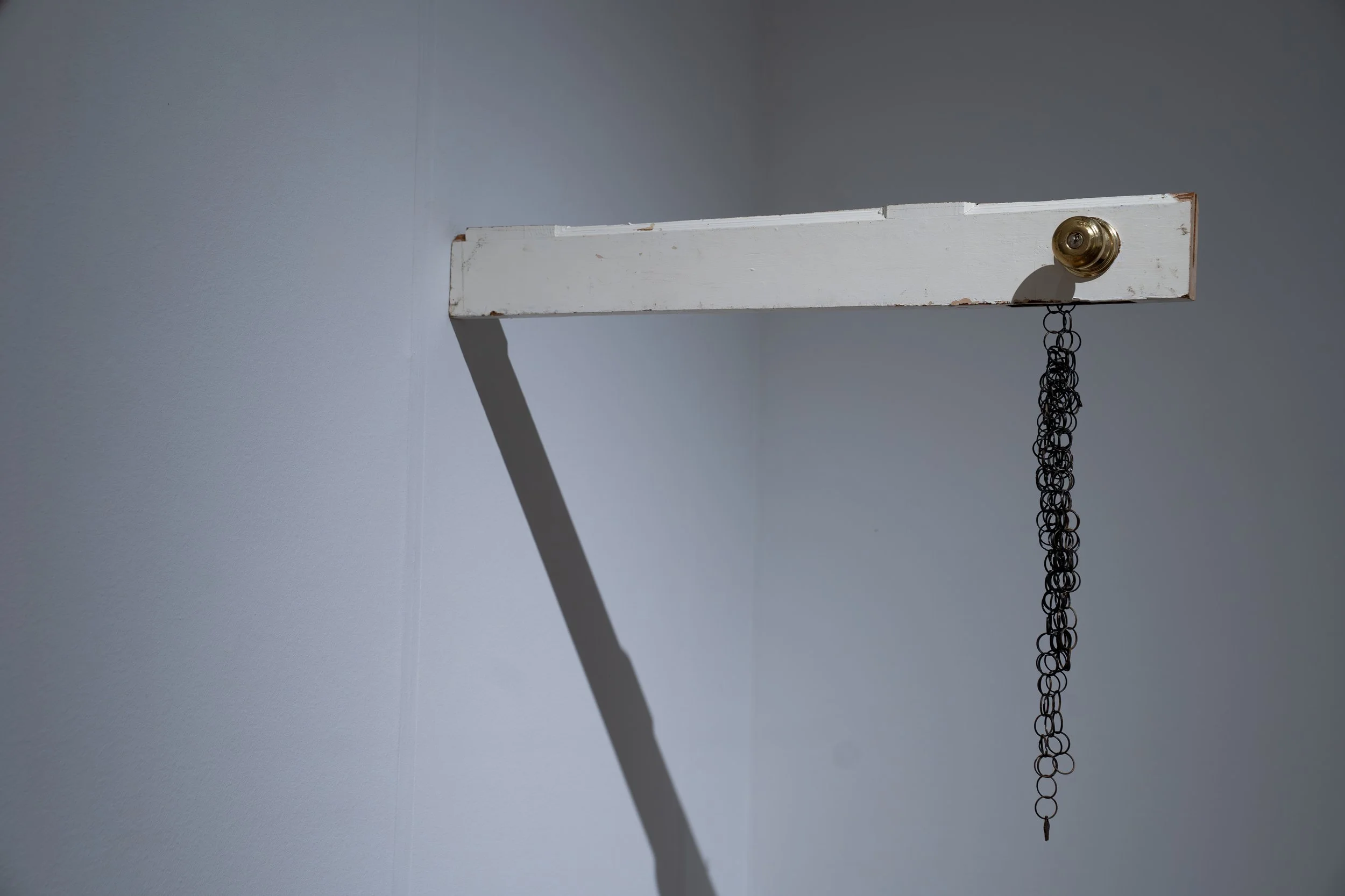 Rich Brown, 
Find Away, 
2026, 
Salvaged door. 
Dimensions variable 
