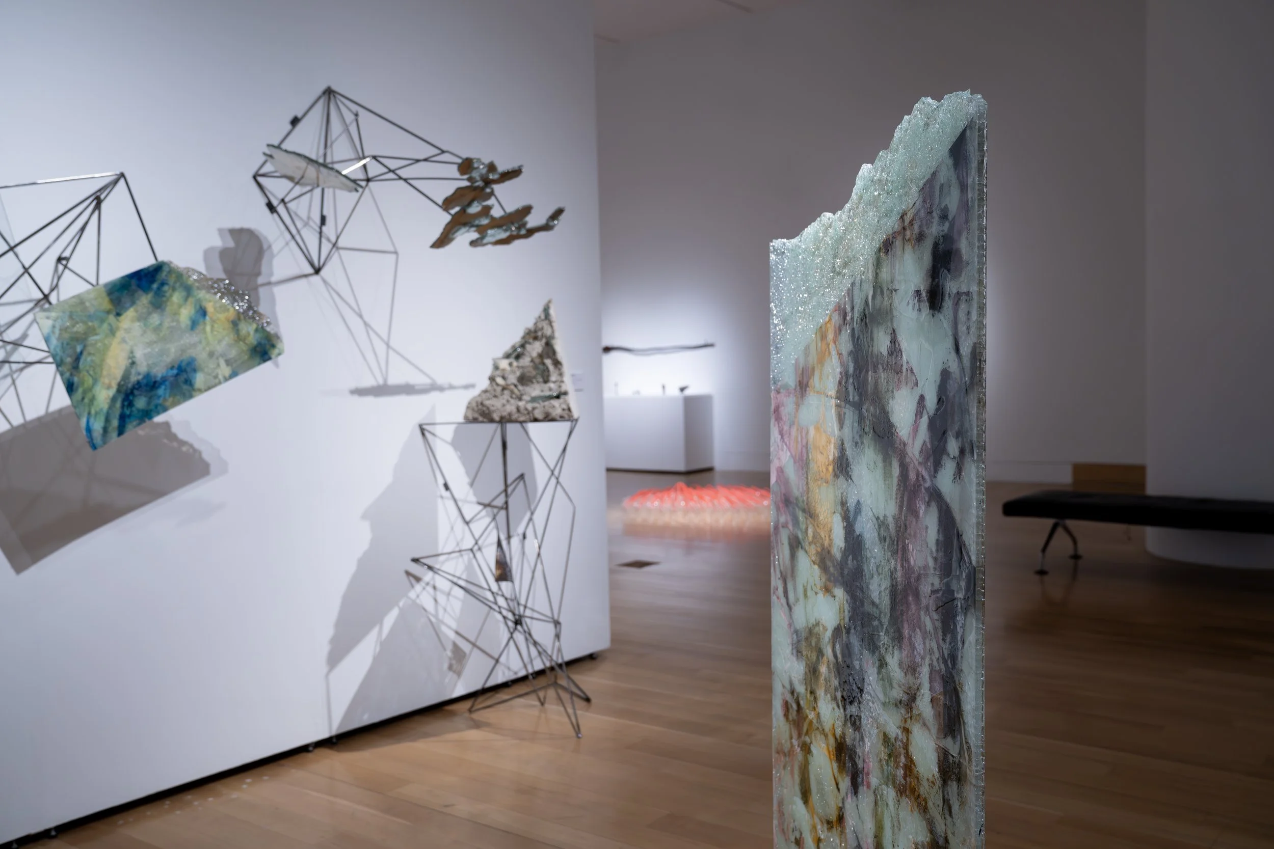 Laura Sallade, 
Mapping Occurrence, 
2026, 
Glass, silver, concrete, mixed-media paints,  
mylar, resin. 
Dimensions variable 