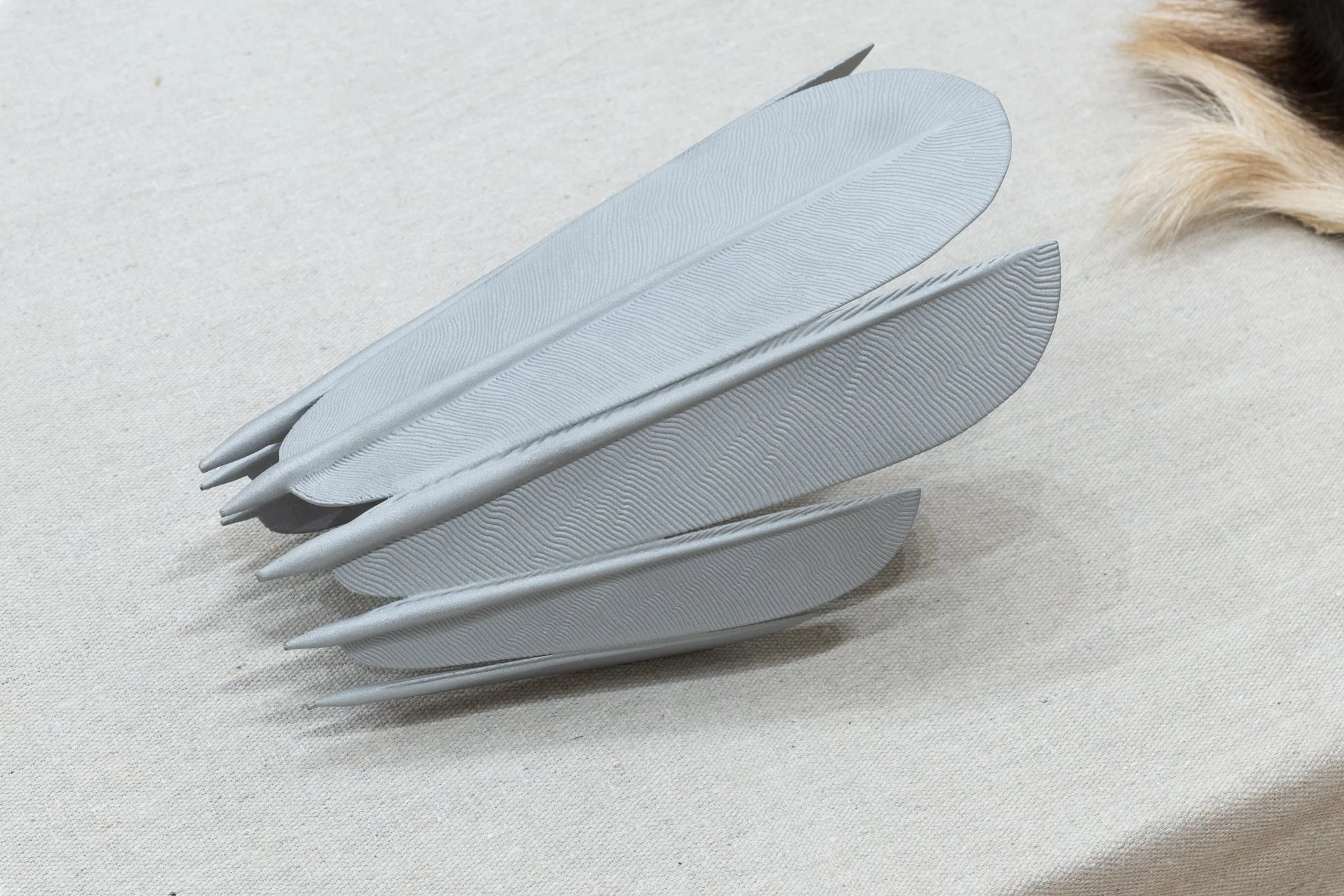 "Feather Cuff," 5" x 3 13/16" x 8", Aluminum, Photo Credit: Sam Fritch 