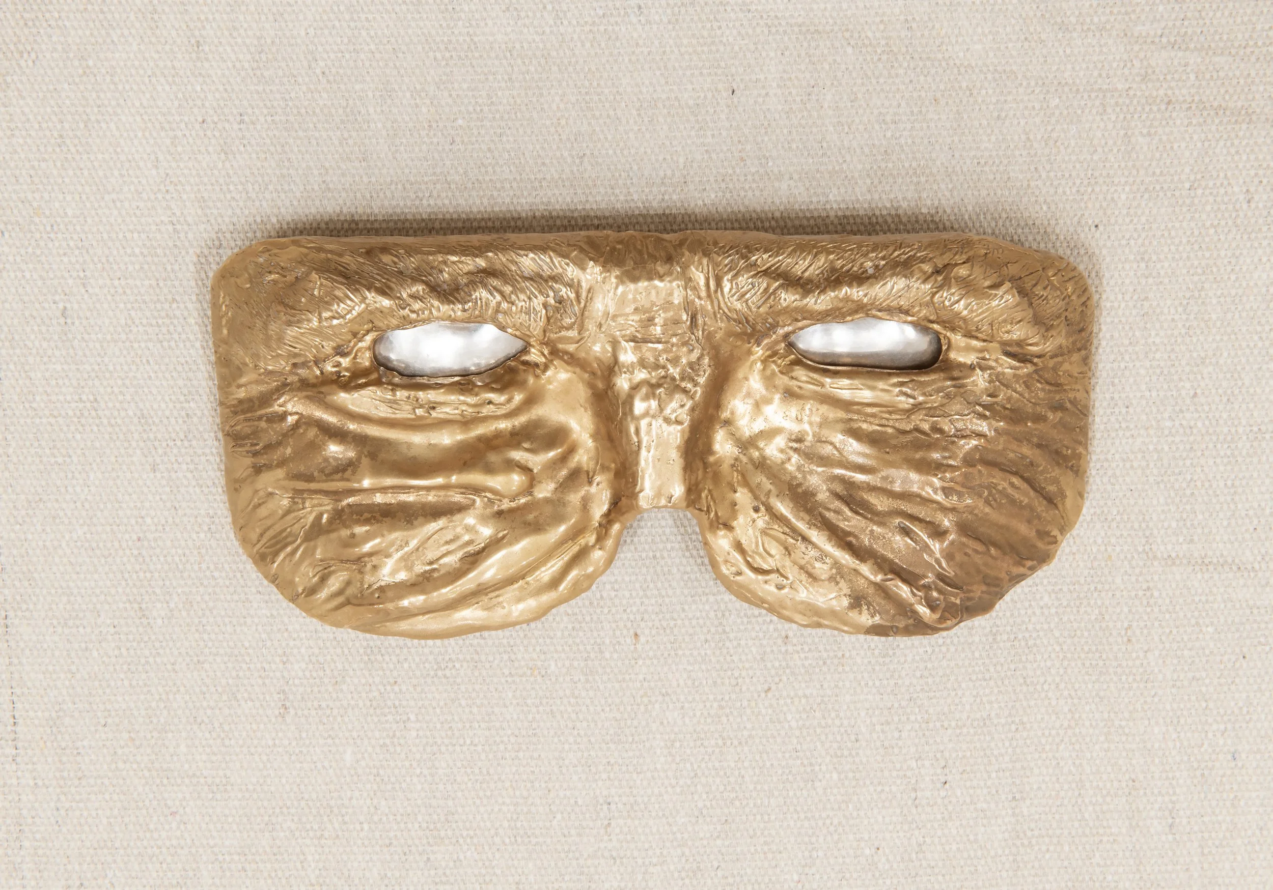 "Face Plate," 6 1/2" x 3" x 1", Bronze, Aluminum, Photo Credit: John Carlano