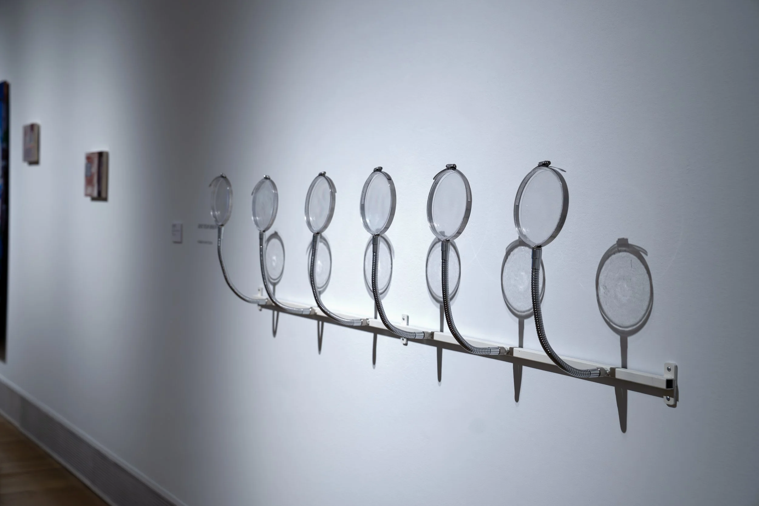 Rachael Henson, 
Breath Experiment II, 
2026, 
Steel, petri dishes, microphone goosenecks,  
Rain-X. 
Dimensions variable.