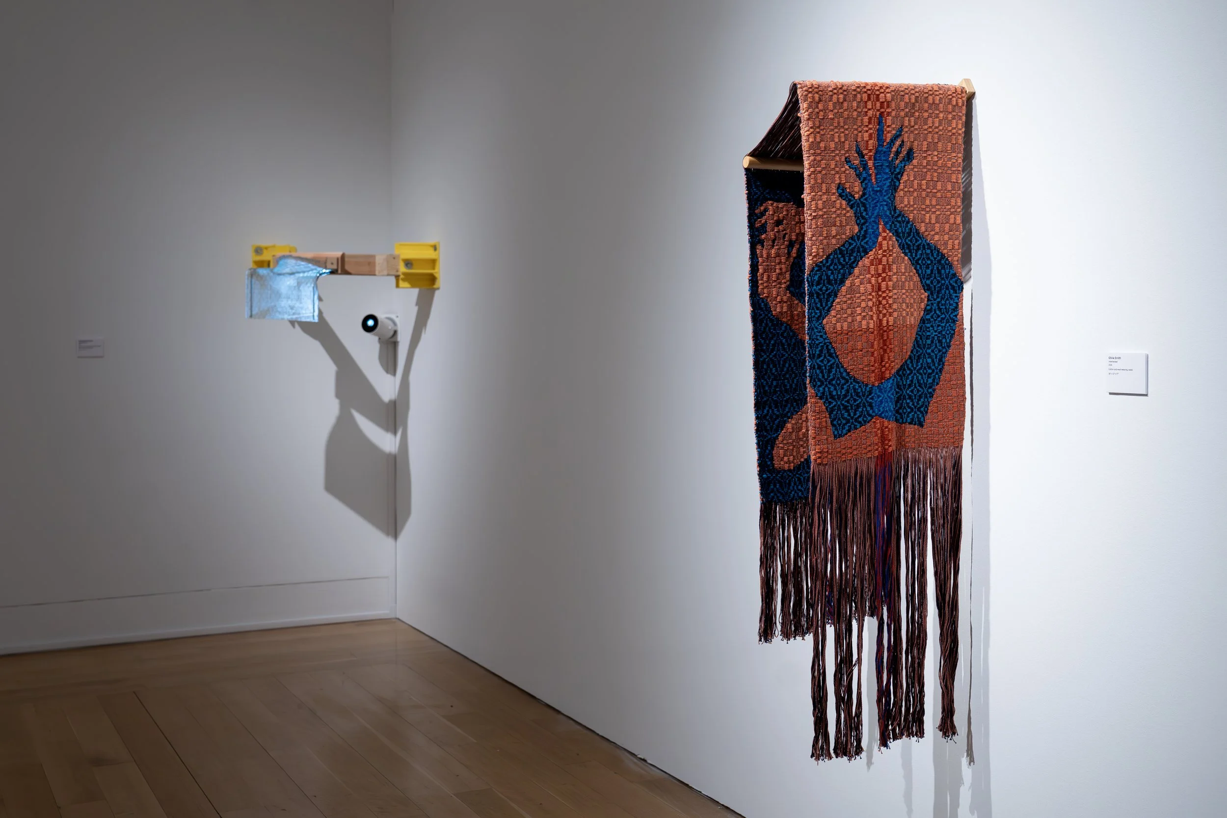 Olivia Smith,
Intertwined, 
2026, 
Cotton and wool weaving, wood. 
36" x 12" x 17" 