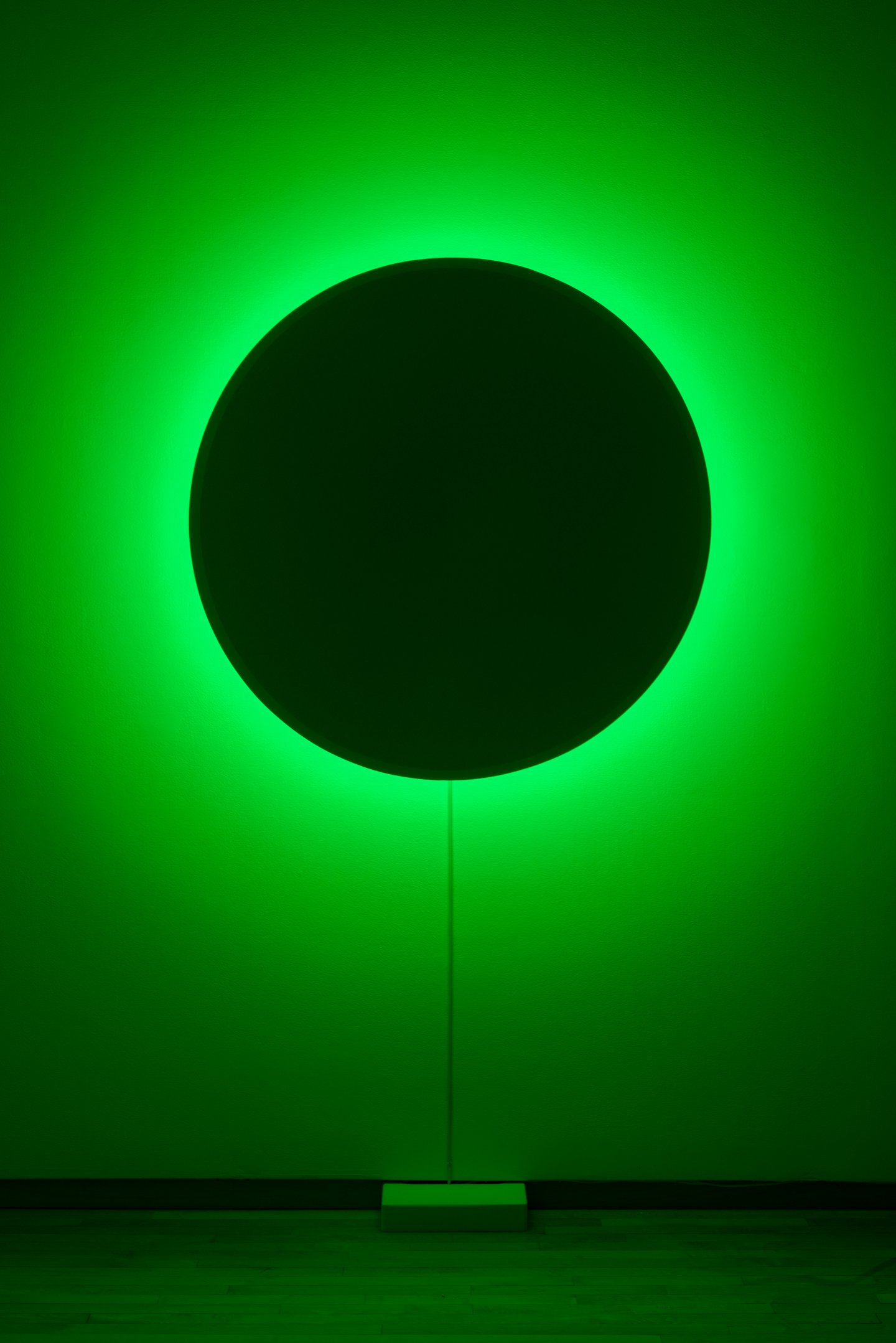 "In Totality" (still), 2025,
Time-based installation view showing “Optic Disc (Blue)”
Retroreflective glass microspheres, acrylic paint, foam, steel, LED light, computer controller. 46” by 46” by 14”
Photo credit: Neighboring States