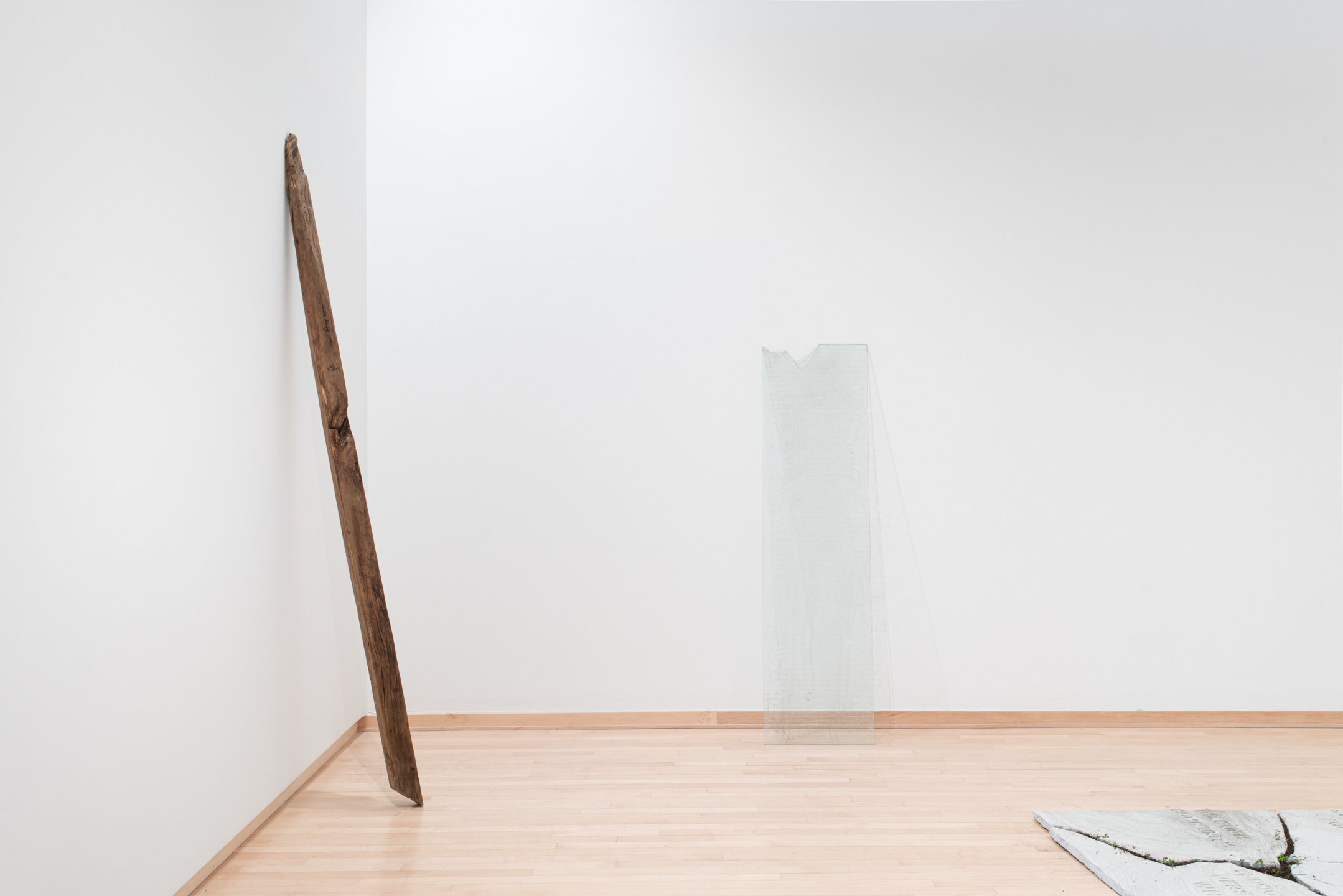 "In the living room peeling skins and You," (gallery installation shot), 2025, Reclaimed found objects from a collapsed West Philadelphia home. Photo Credit: Neighboring States