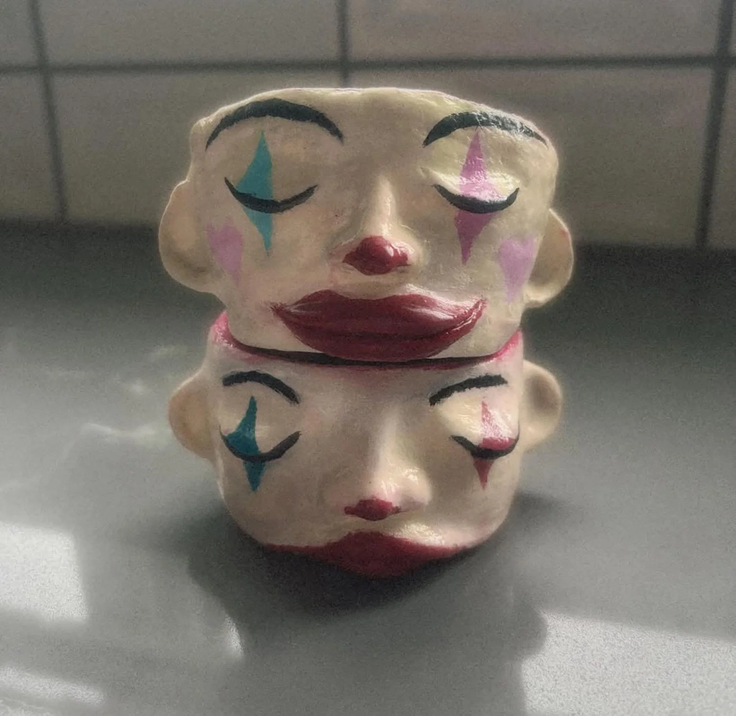 "Dolly and Polly" 2024, Clay and acrylic paint, each is 2" x 3"