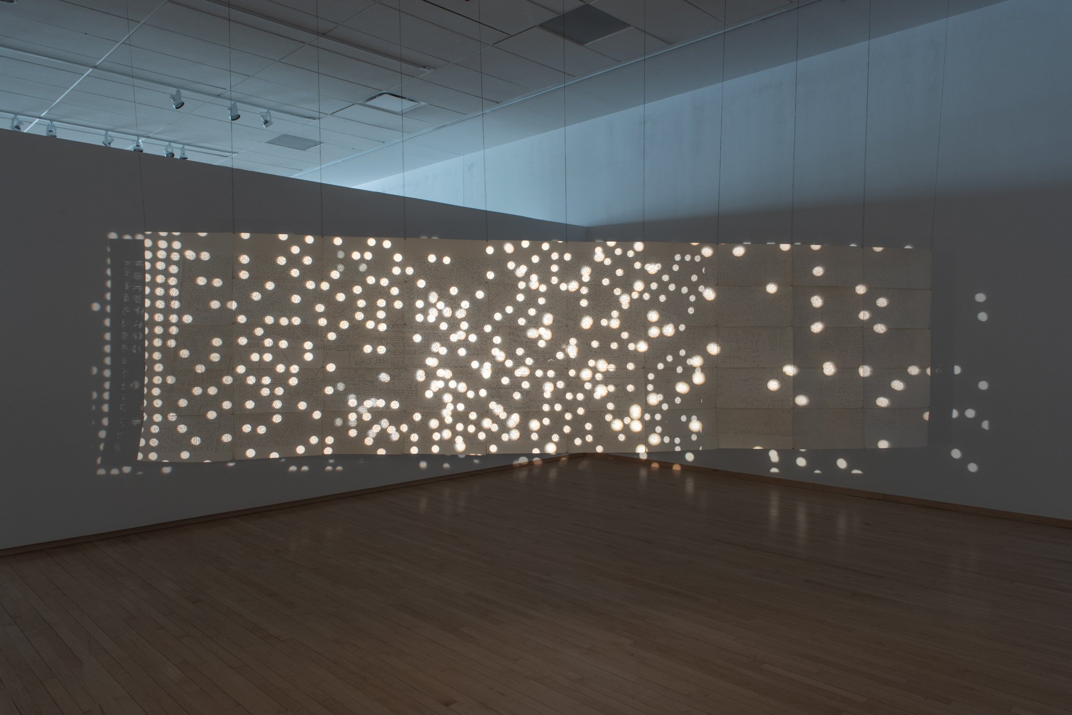 "Babycamera Dream Boat,"
2025,
Perforated cotton paper, waxed linen thread, overhead projectors.
4’ x 15’
Photo Credit: Neighboring States