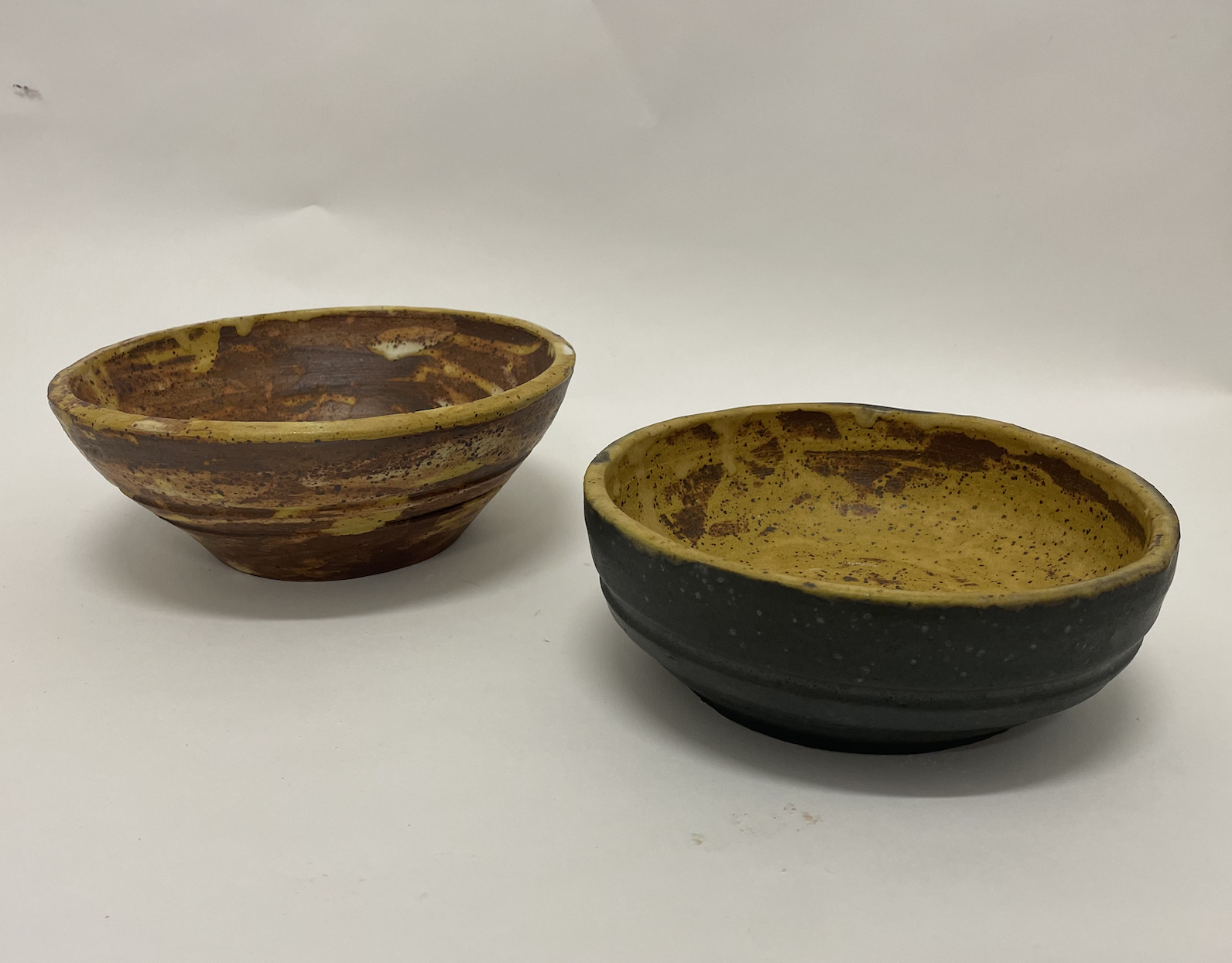 Untitled bowls, 2023, thrown ceramic with glaze, Diameters: Left 6", Right 8"