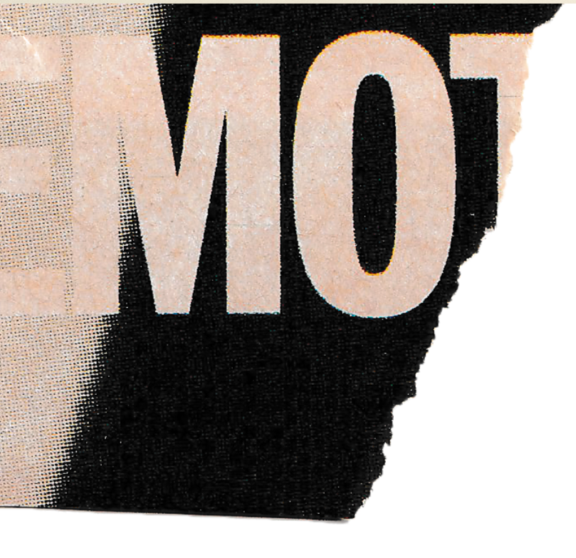 Close-up of partial text 'NO' on a printed poster or newspaper with a black background.