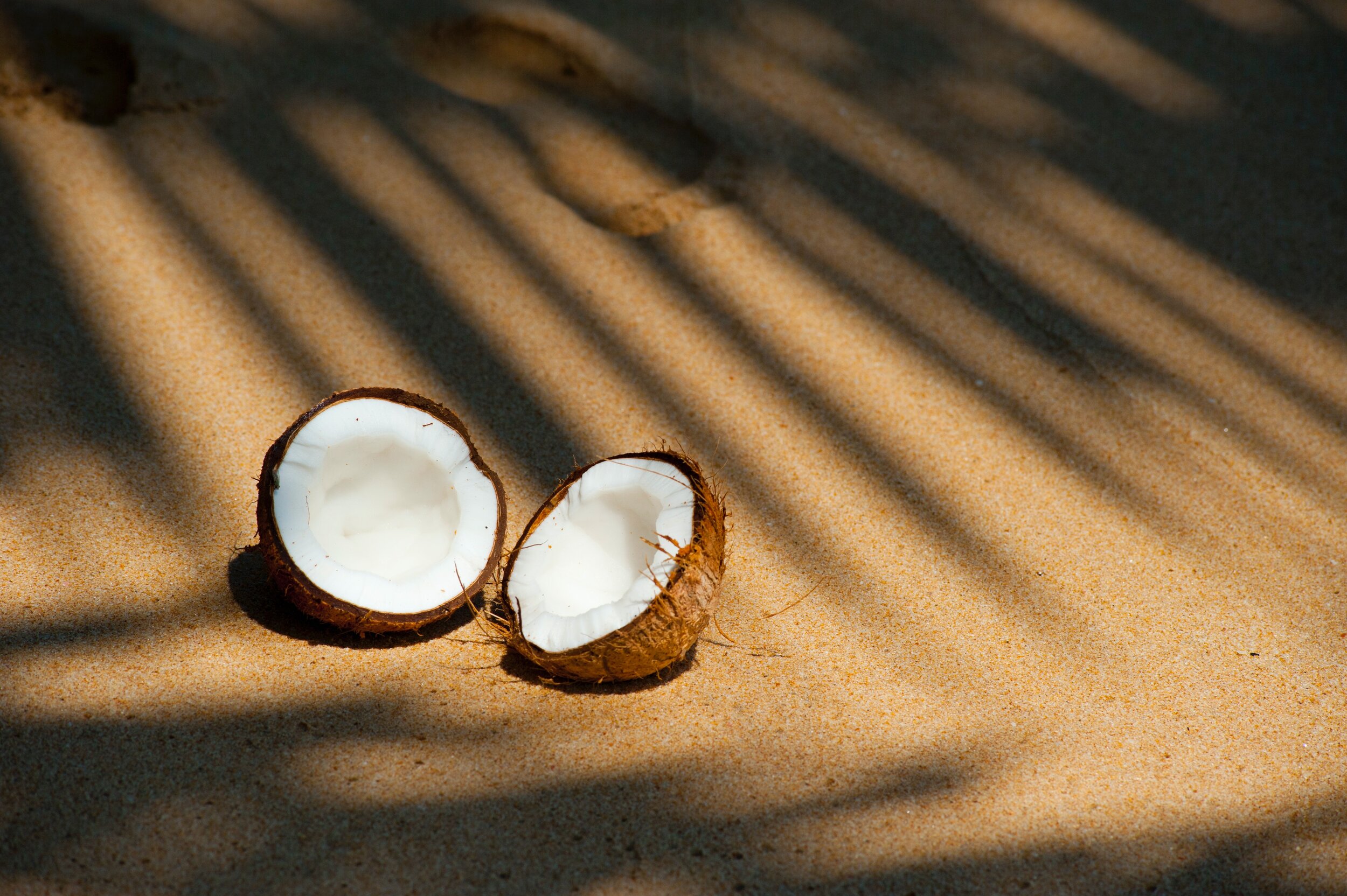 coconuts on sand by pexels.jpg