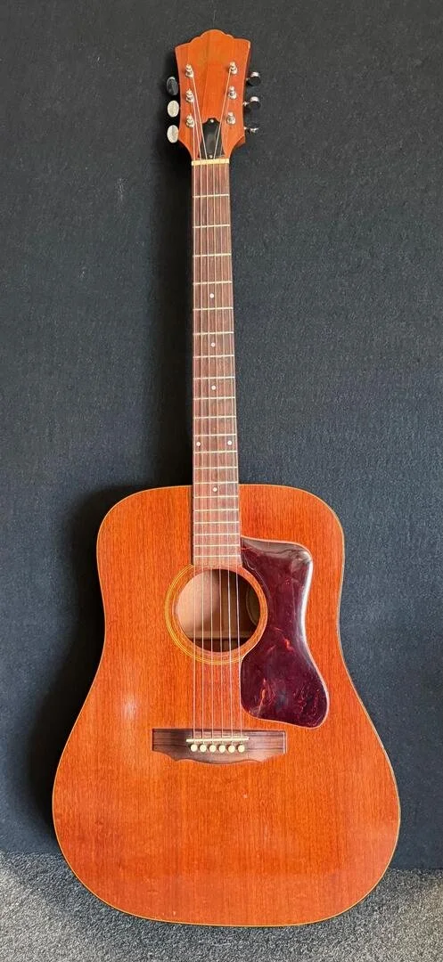 Used Early 70's Guild D-25- with soft case