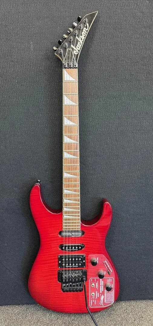 Used Jackson Japanese DK2S with sustainiac- see thru cherry red