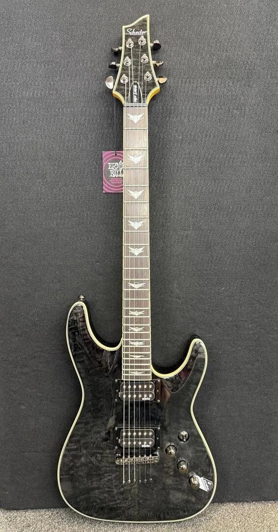 Schecter Omen Extreme 6- See Thru Black